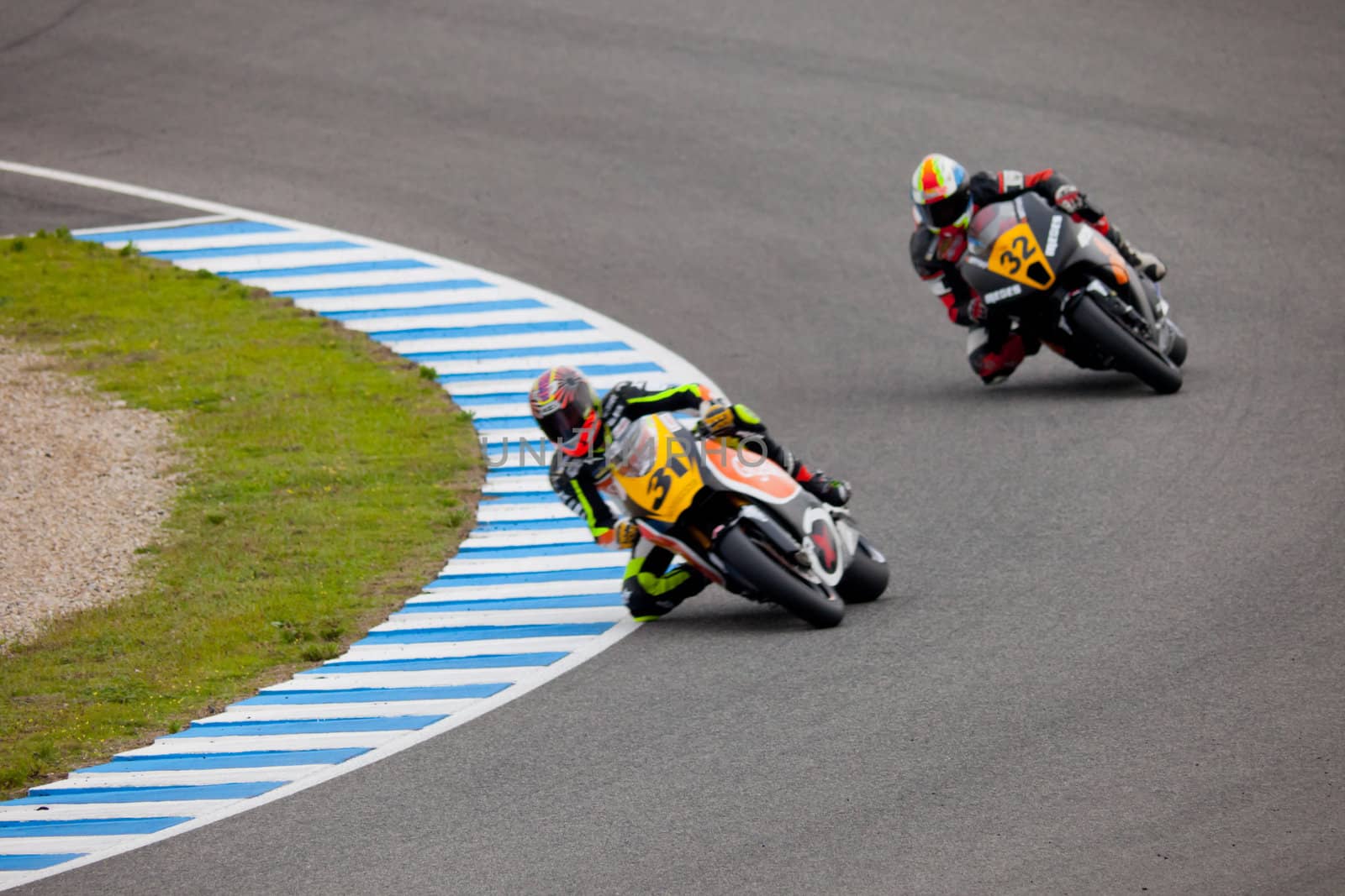JEREZ DE LA FRONTERA, SPAIN - NOV 20: MOTO2 motorcyclist Carmelo Morales and Alejandro Martinez takes a curve in the CEV championship on Nov 20, 2010, in Jerez de la Frontera, Spain