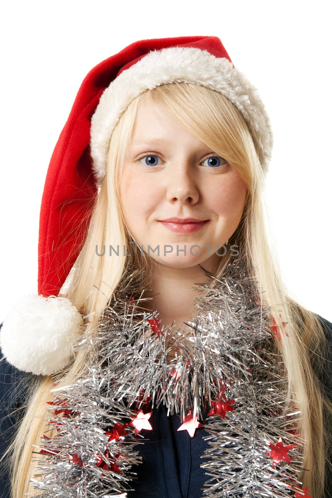 A beautiful young blonde in a Santa hat on a white background