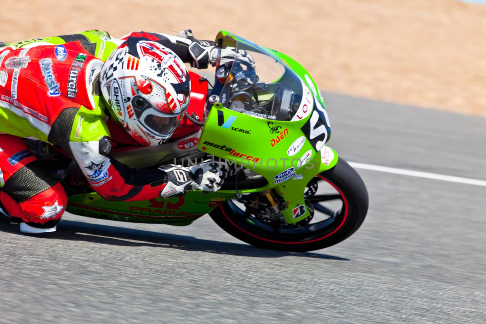 JEREZ DE LA FRONTERA, SPAIN - APR 17: 125cc motorcyclist Juanfran Guevara takes a curve in the CEV Championship race on April 17, 2011 in Jerez de la Frontera, Spain.