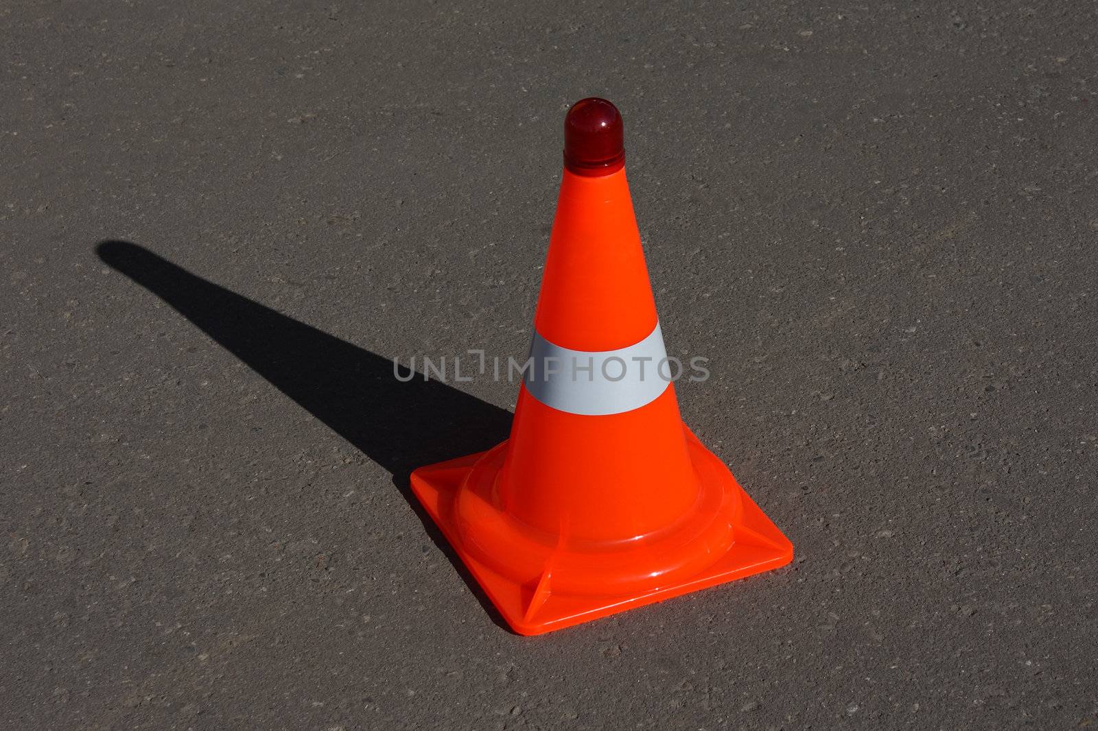 Safety warning sign - road traffic cone on street