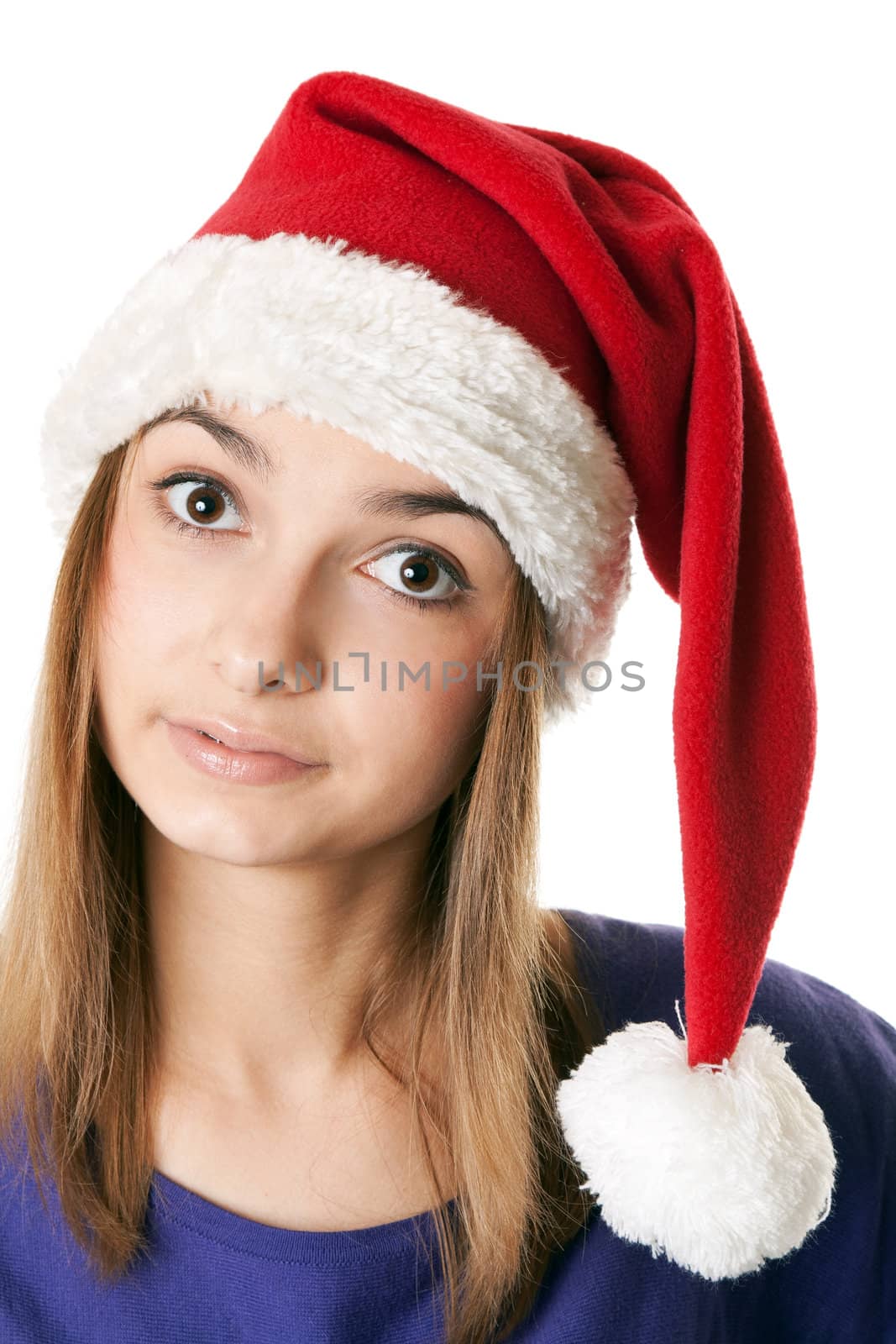 Beautiful girl in red Santa hat on a white background