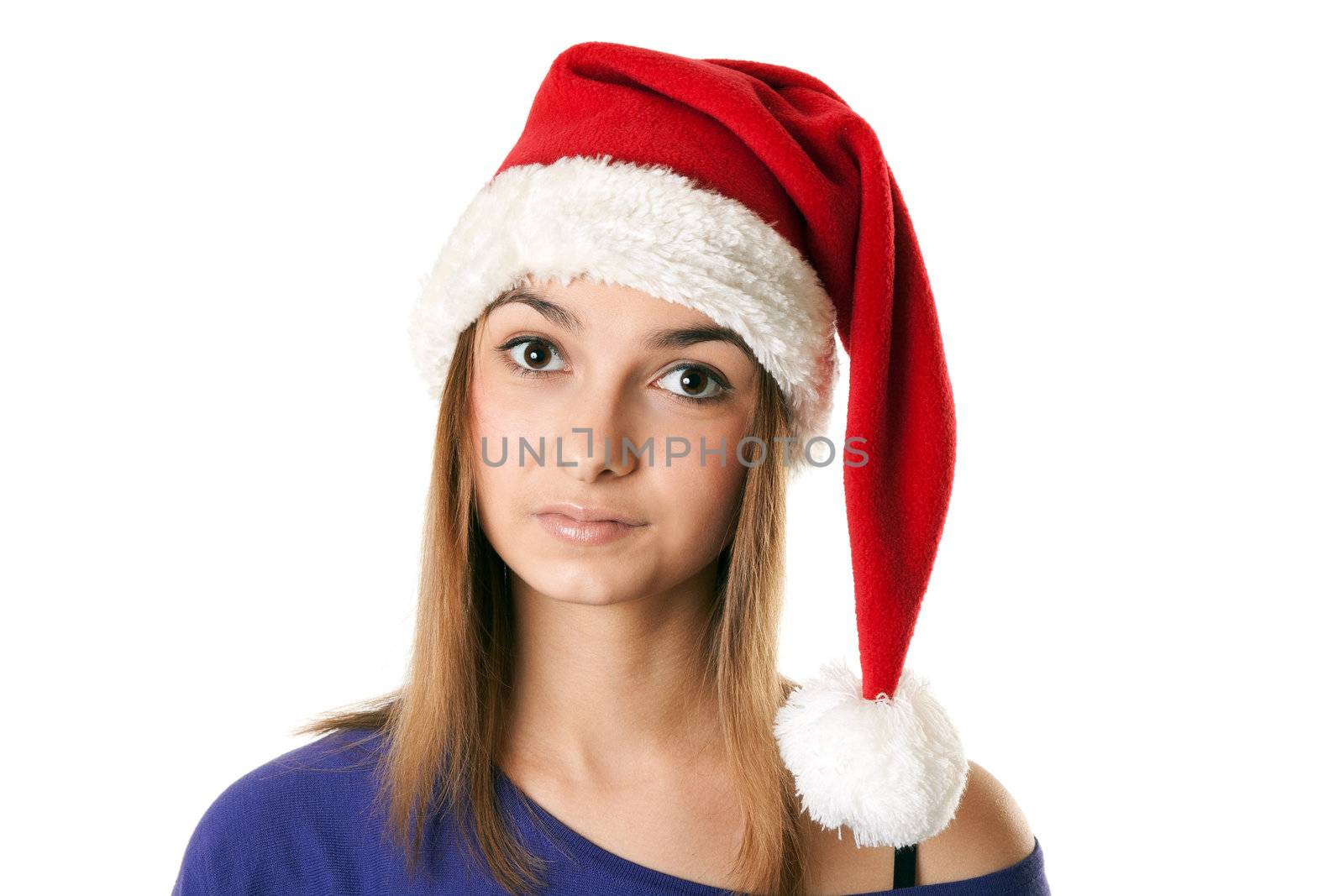 Beautiful girl in red Santa hat on a white background