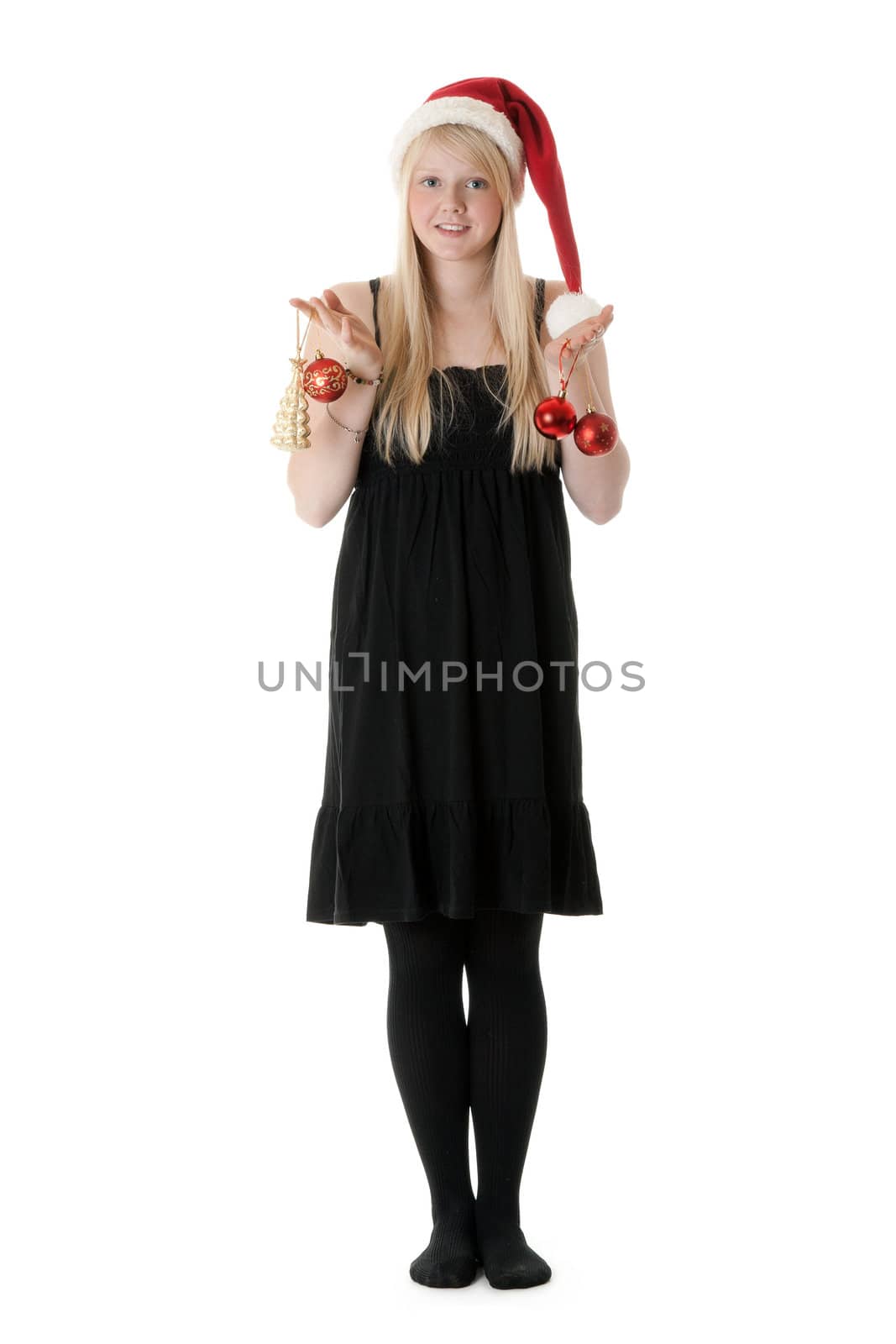 Young beautiful girl in a Santa hat on a white background