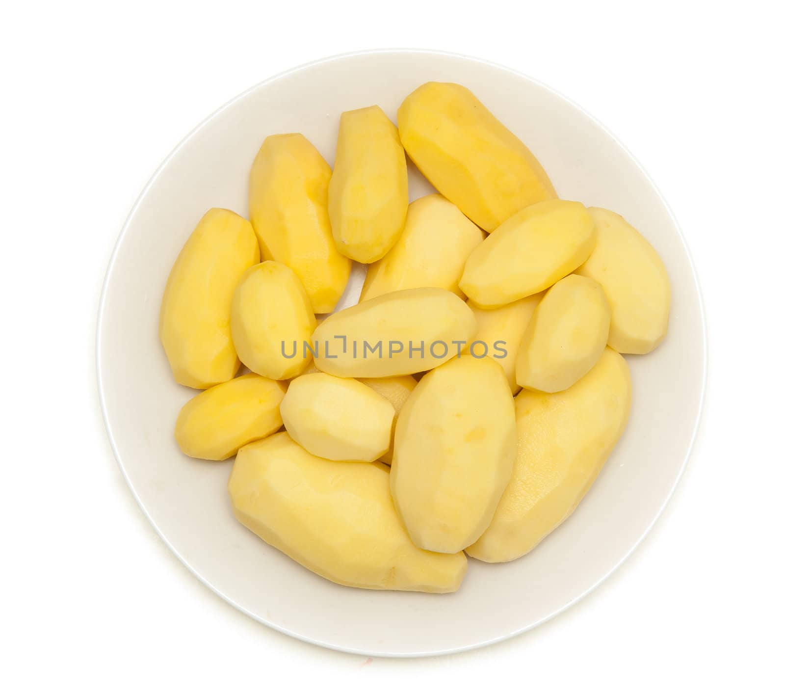 Purified crude potato on a plate on a white background