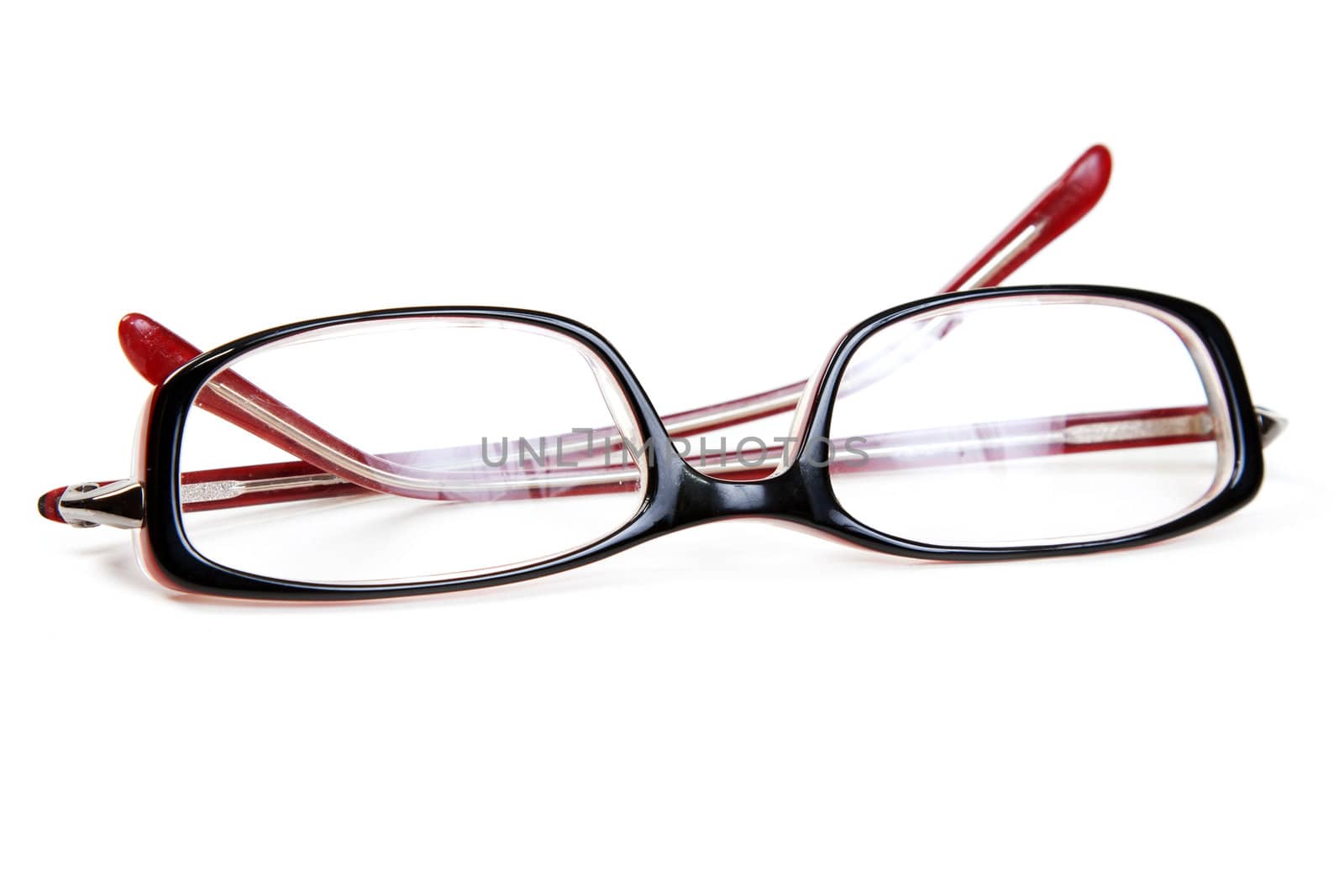 Stylish red glasses on a white background