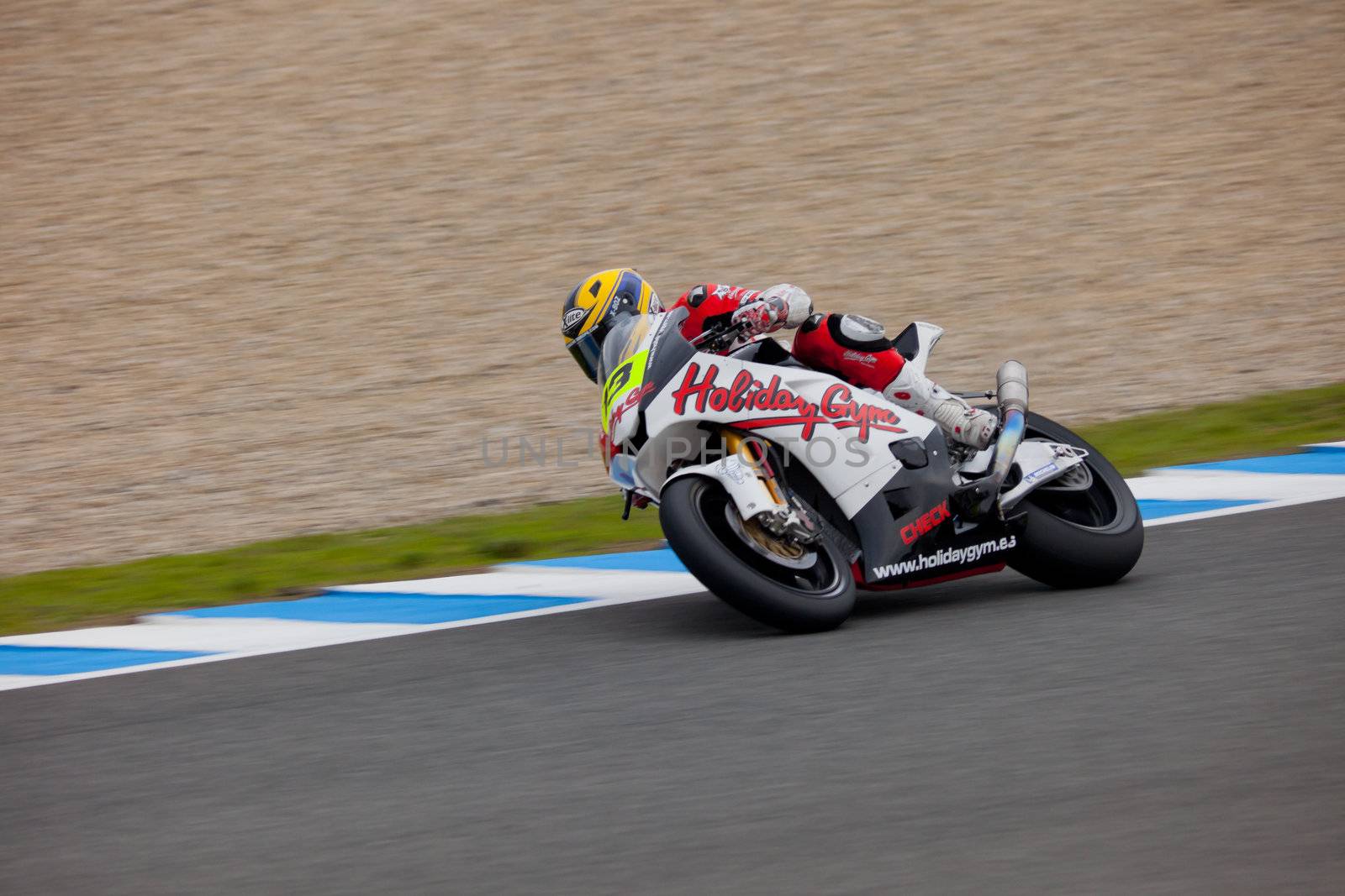 JEREZ DE LA FRONTERA, SPAIN - NOV 20: Moto2  motorcyclist Xavier Simeon takes a curve  in the CEV championship on Nov 20, 2010, in racetrack of velocity of Jerez de la Frontera, Spain