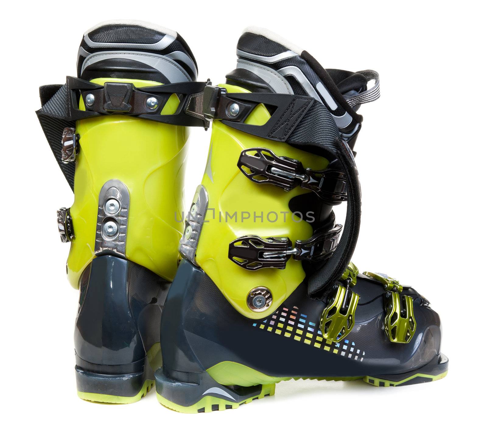 Pair green-dark ski shoe insulated on white background