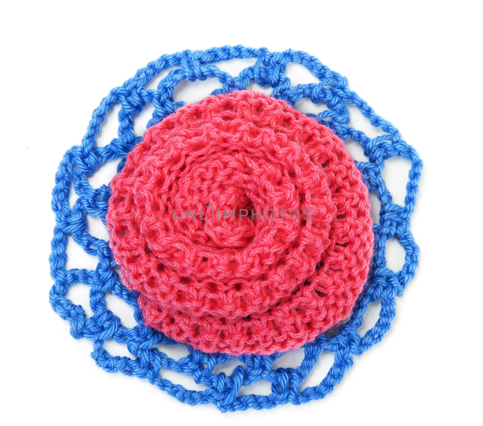 Knitted roses of red and blue thread
