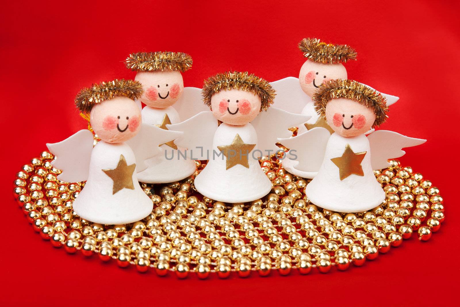 Decorative angel from a set scrapbooking on a red background