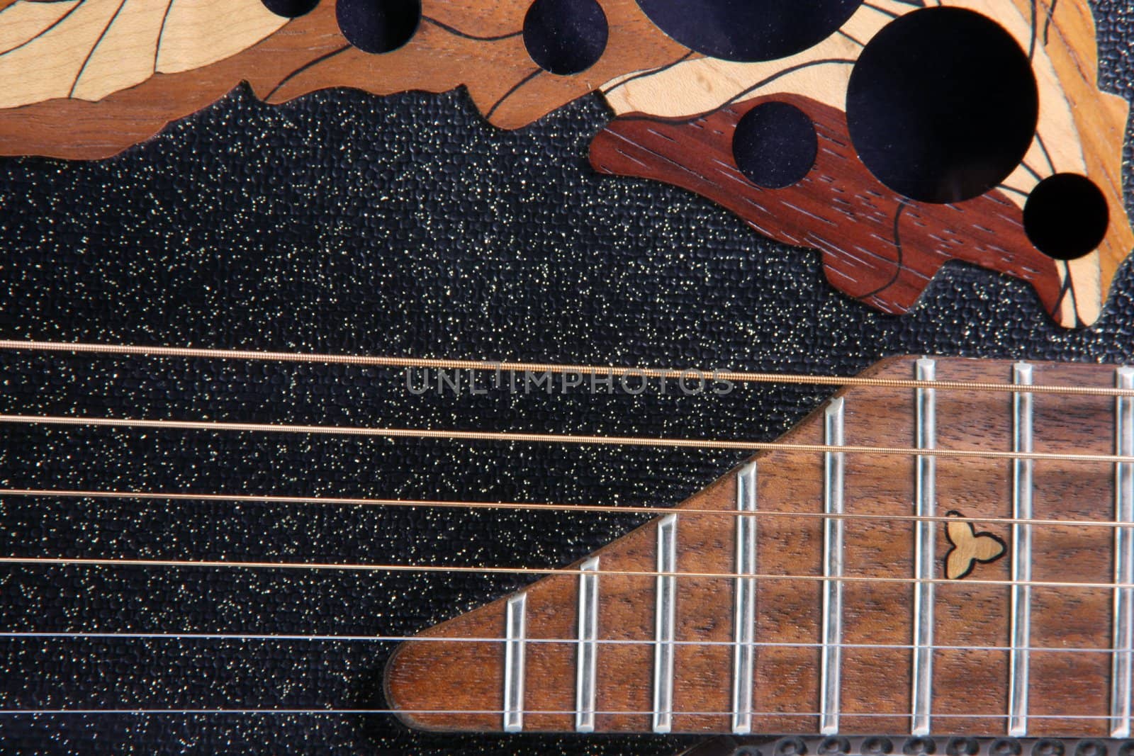 strings of black classic electrical guitar music equipment