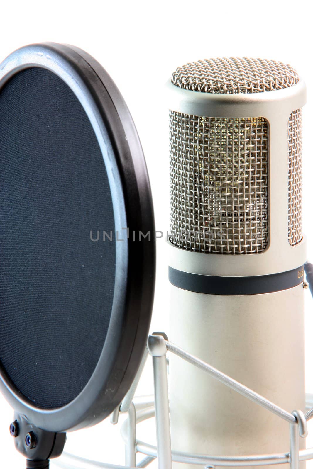 detail from microphone and filter isolated on white music concepts