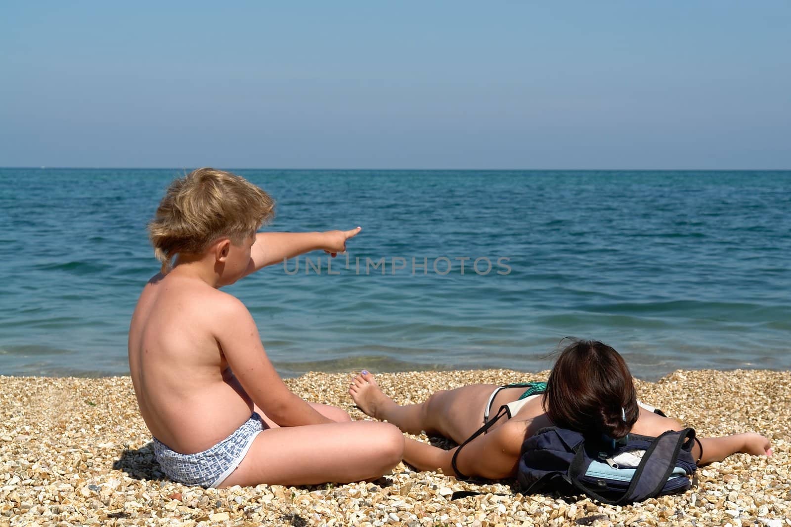 Mum and the son on the beach