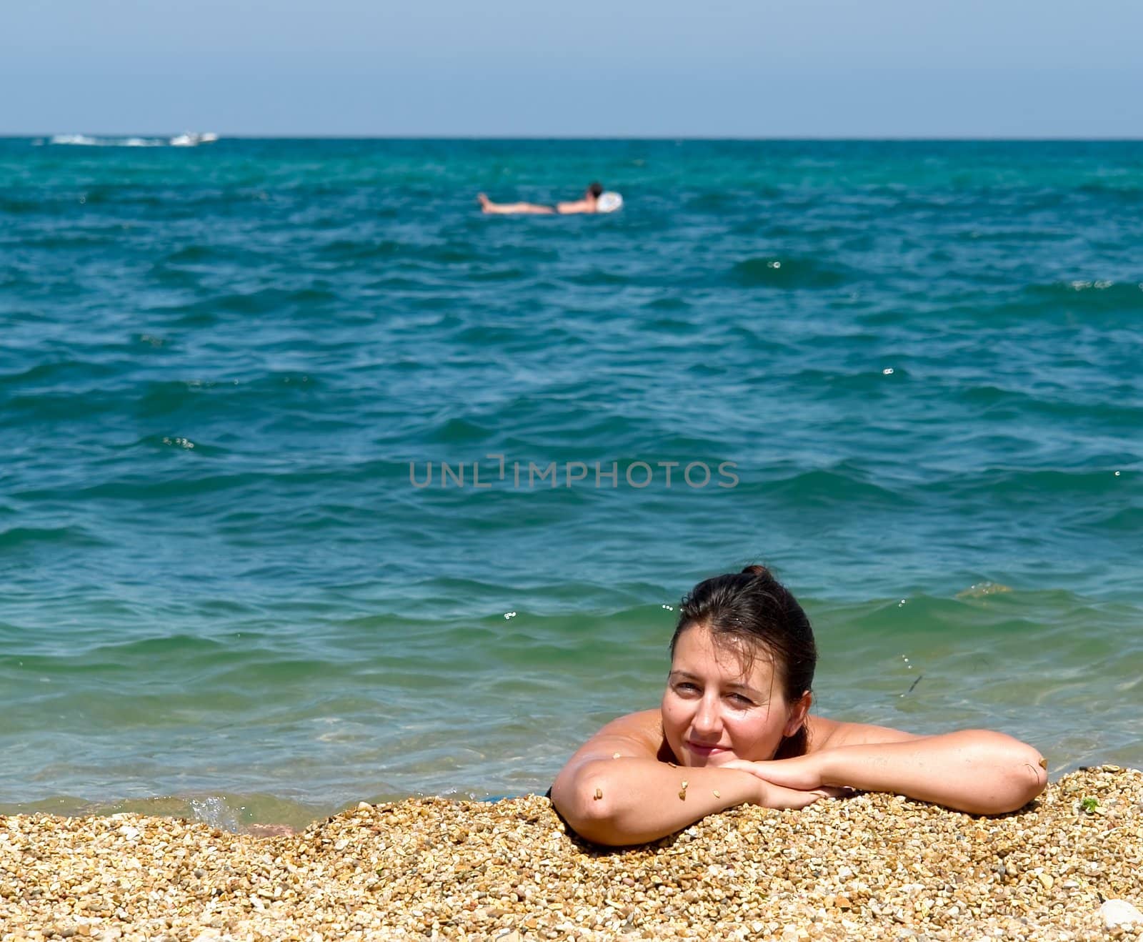 Summer Days. Beautiful Young Woman on the Beach.