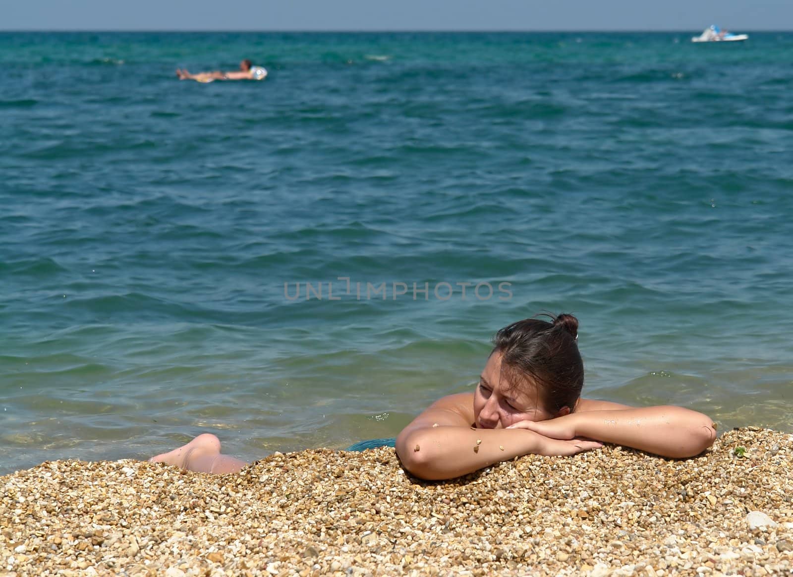 Summer Days. Beautiful Young Woman on the Beach.
