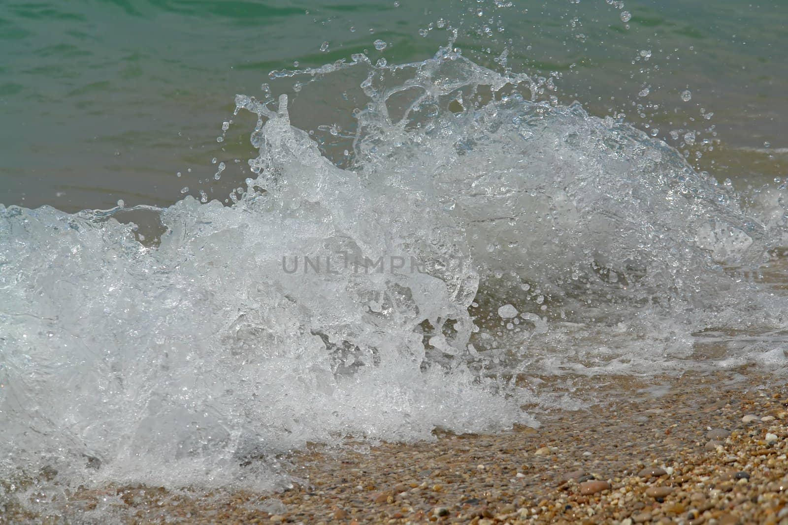 Sea surf. The wave breaks about coast.