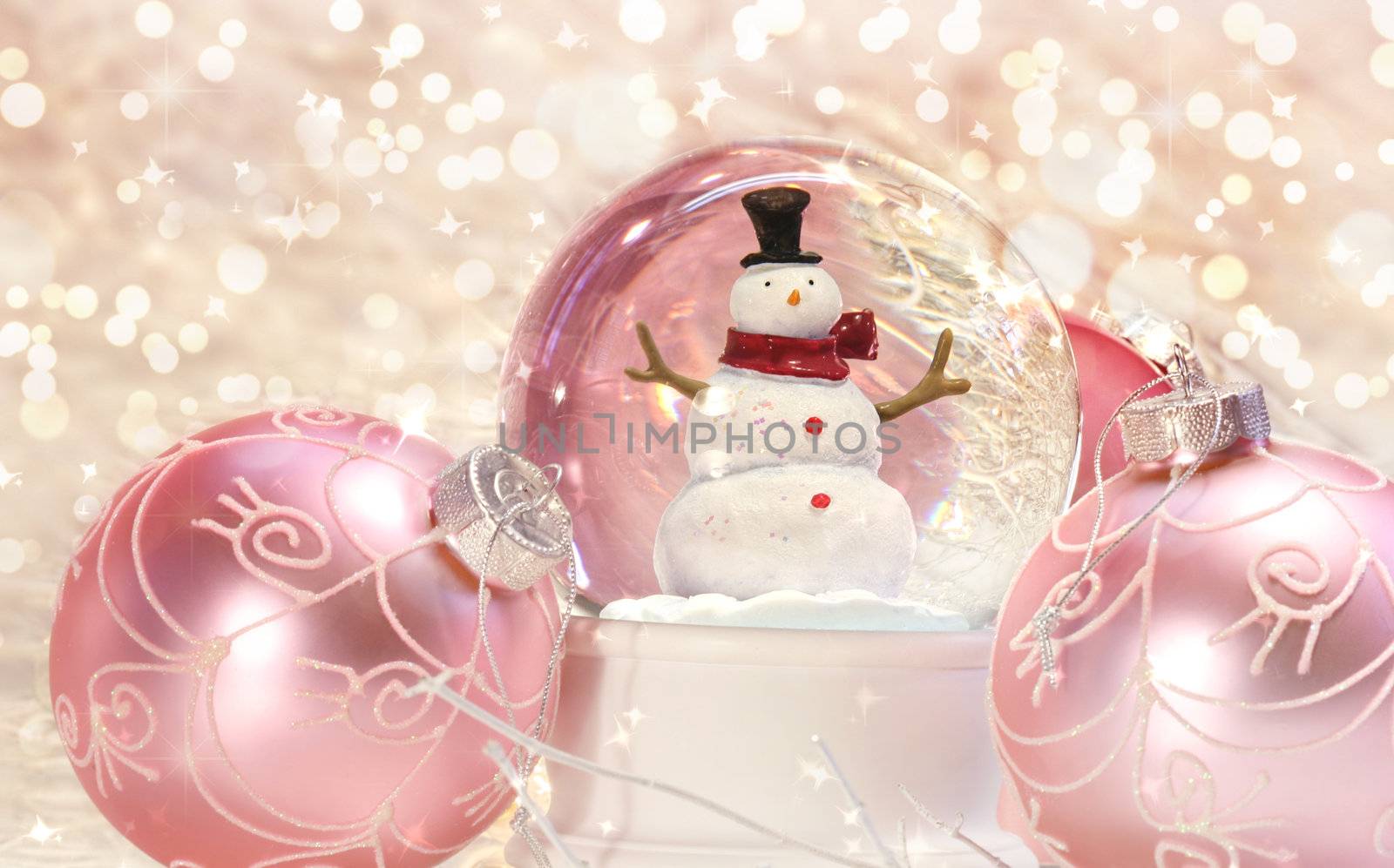 Snow globe with pink ornaments  by Sandralise