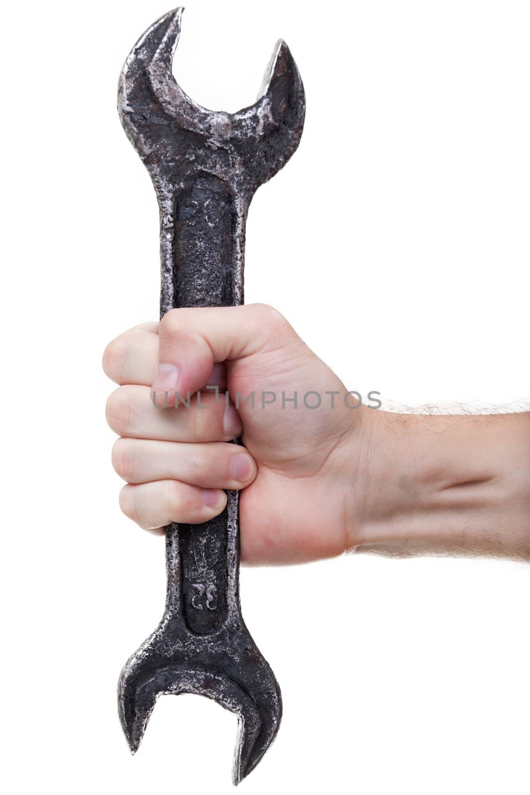 Metal wrench tool in hand  by ia_64