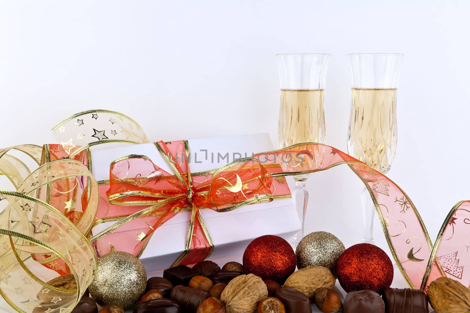 Glass of champagne against white background.