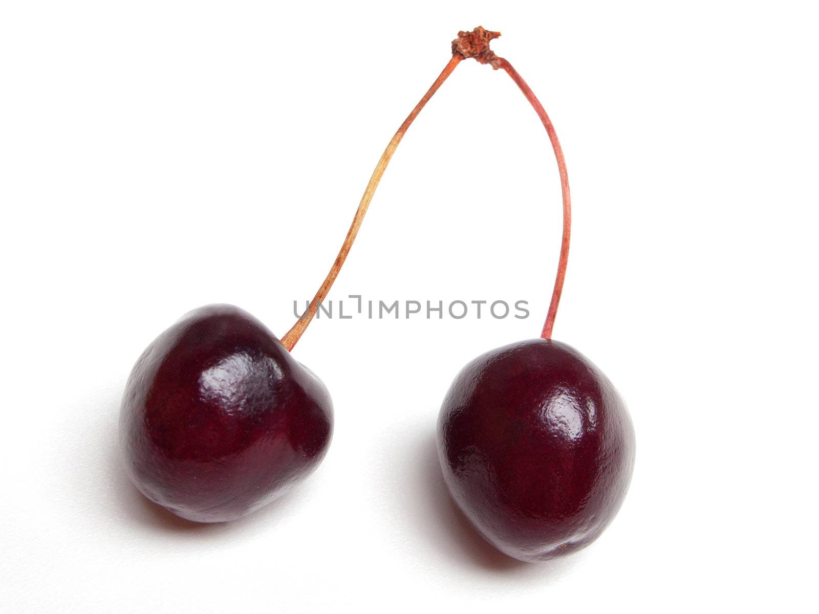 Healthy food - sweet red cherry berry on white