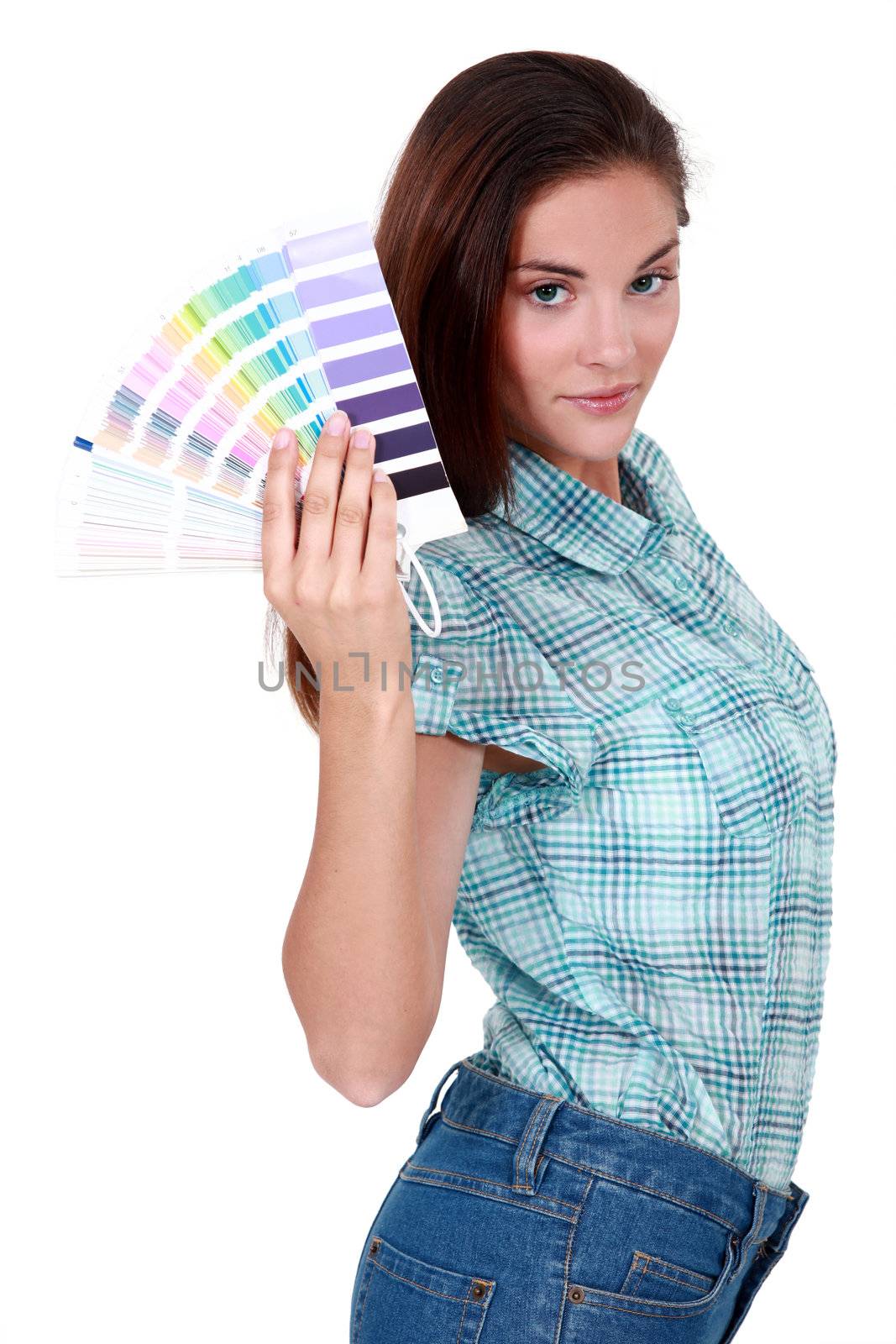 woman holding a color chart
