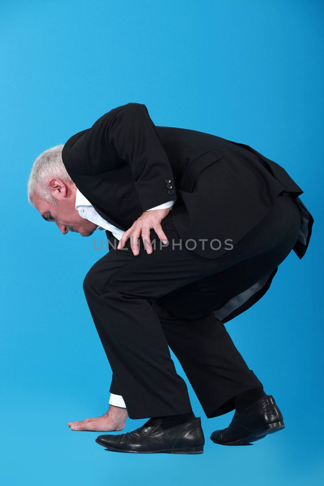 businessman touching the floor by phovoir