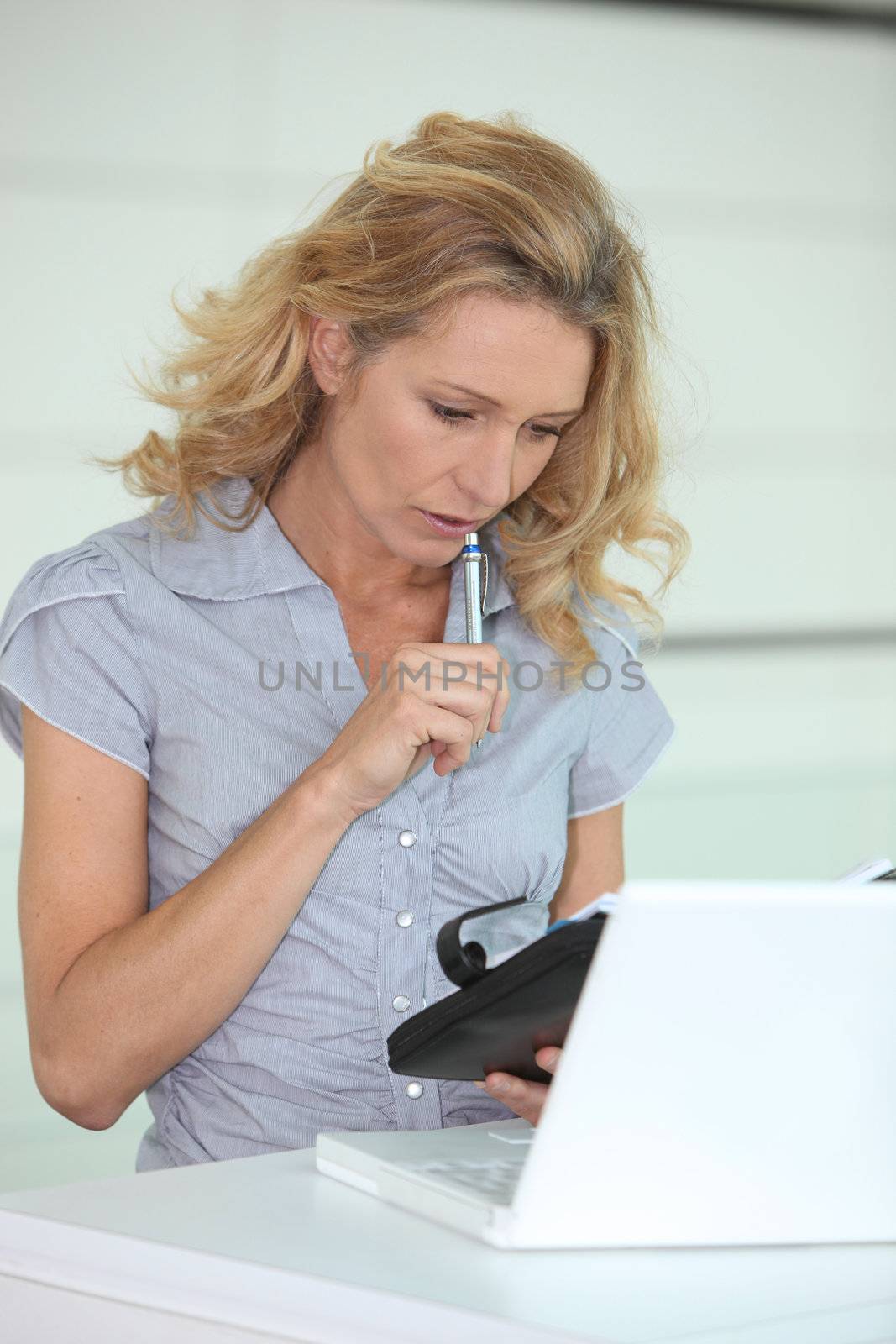 portrait of a woman with agenda by phovoir