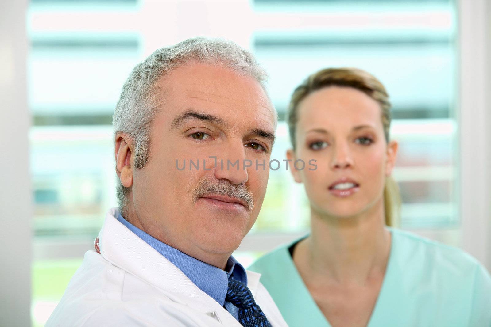 Friendly looking doctor and nurse