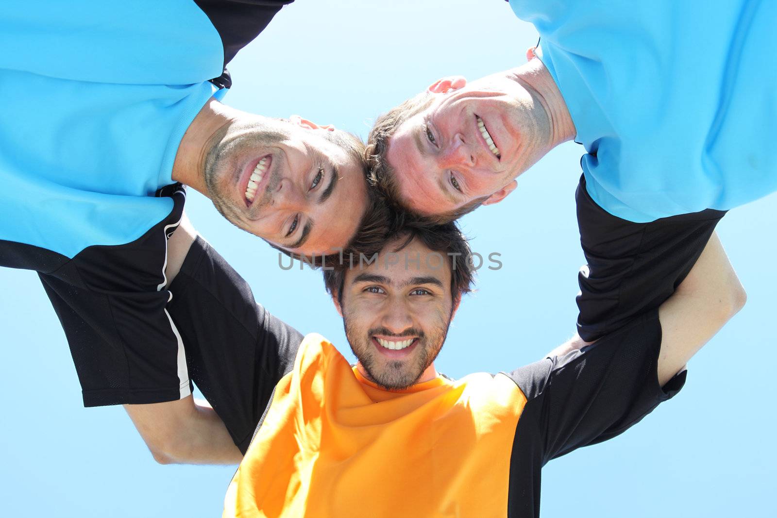 low-angle shot of 3 players by phovoir