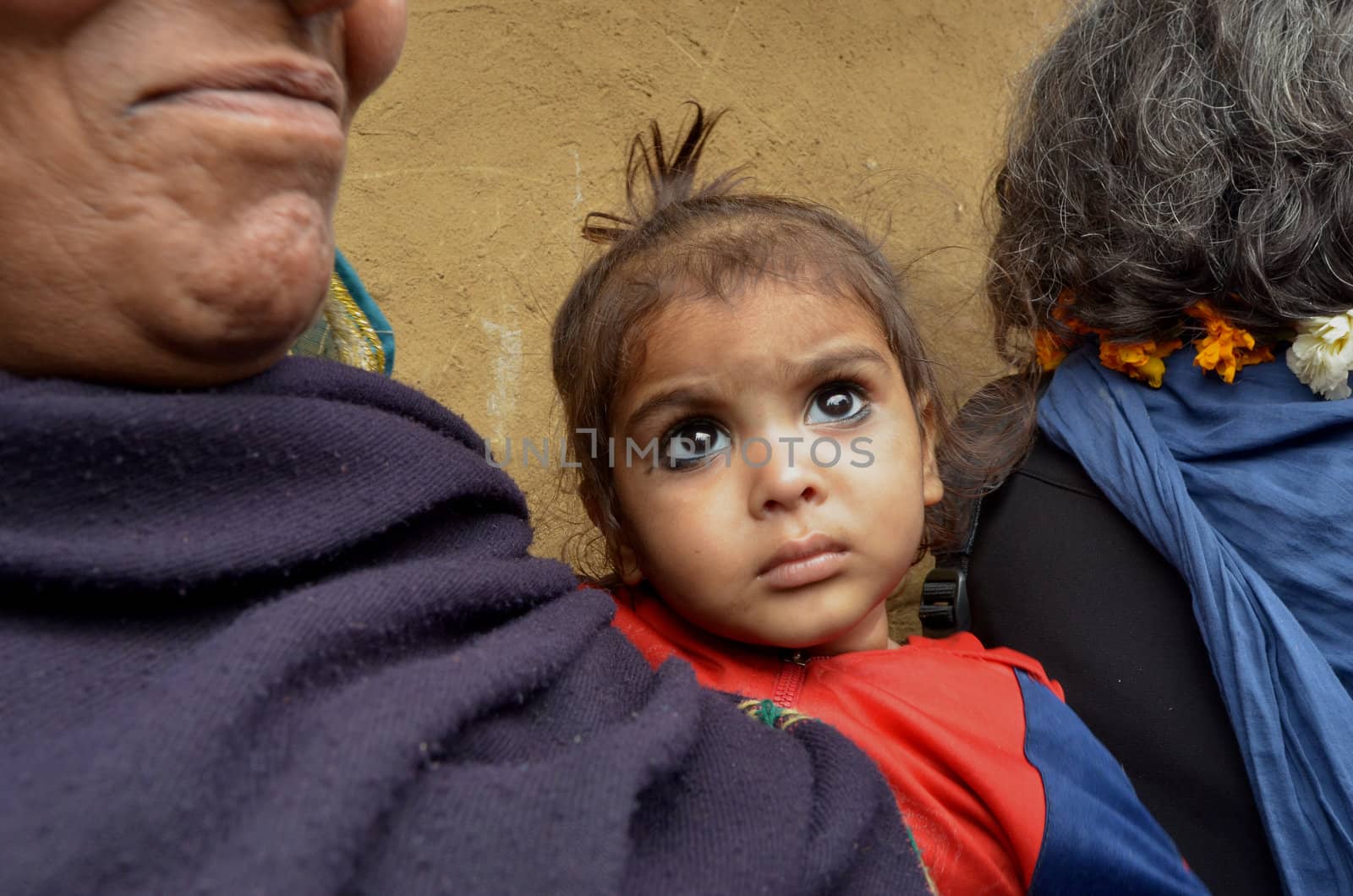 New Delhi,India-February 4, 2013:An unidentified child lives in the slums of New Delhi. 50% of the population of New Delhi is thought to live in slums,on February 4,2013 in New Delhi