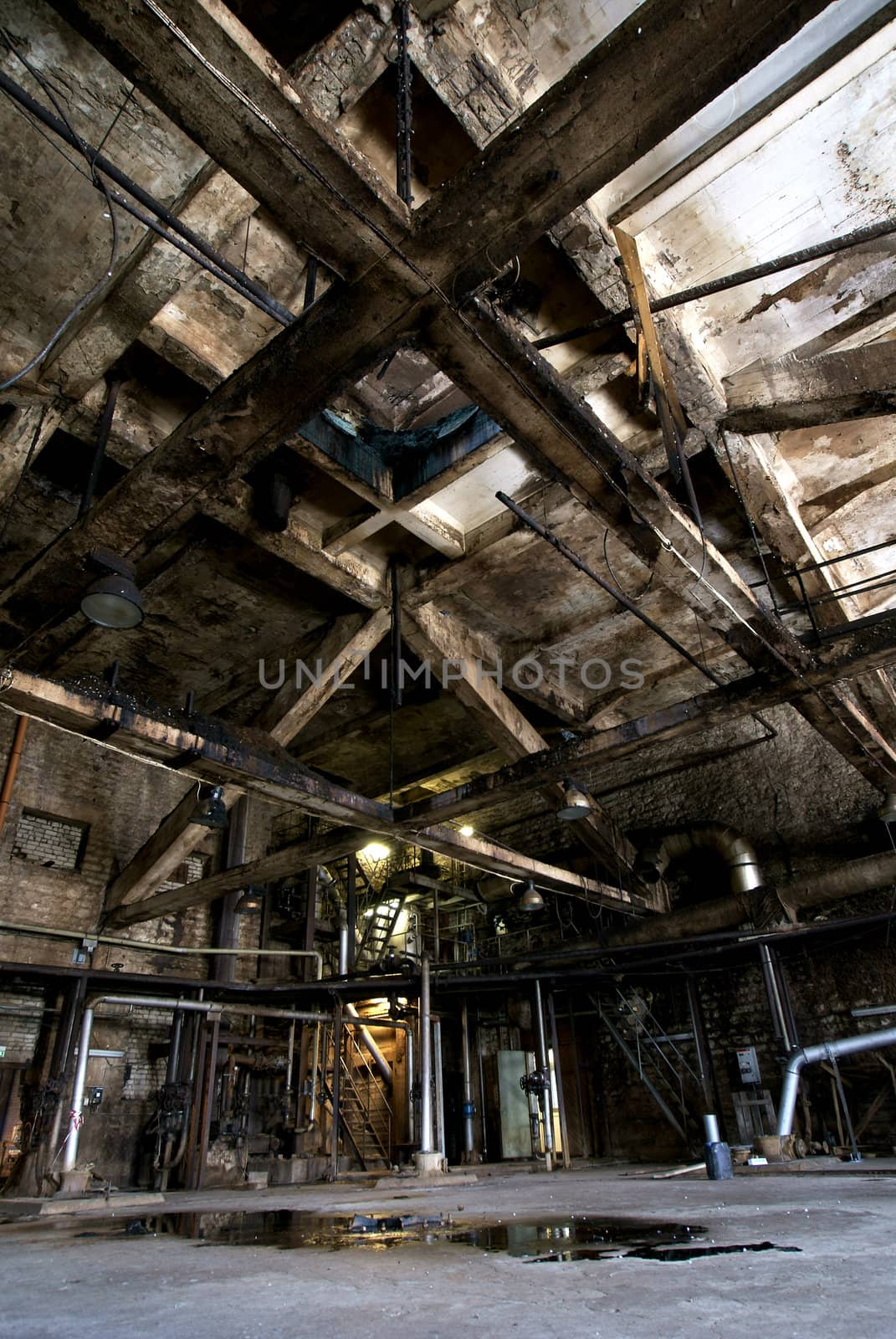 Old abandoned dirty empty scary factory interior