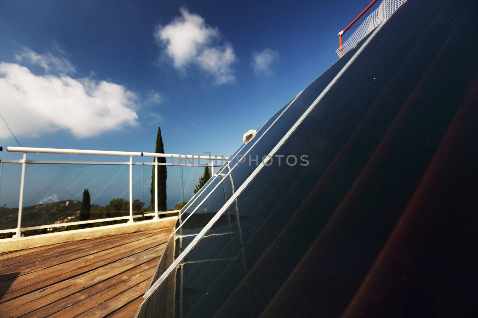 sun battery on blue sky background