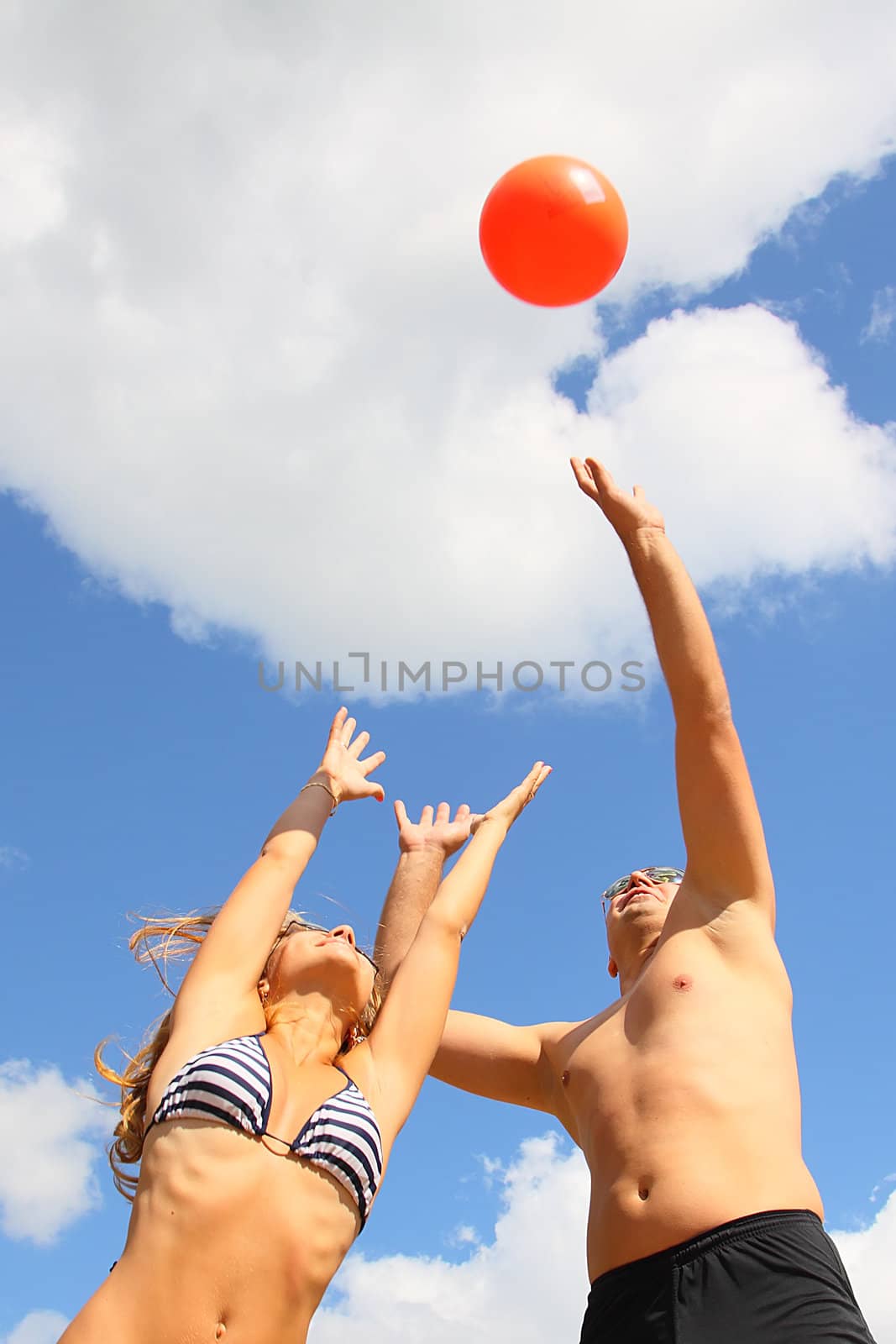 Young men have a rest and play a beach