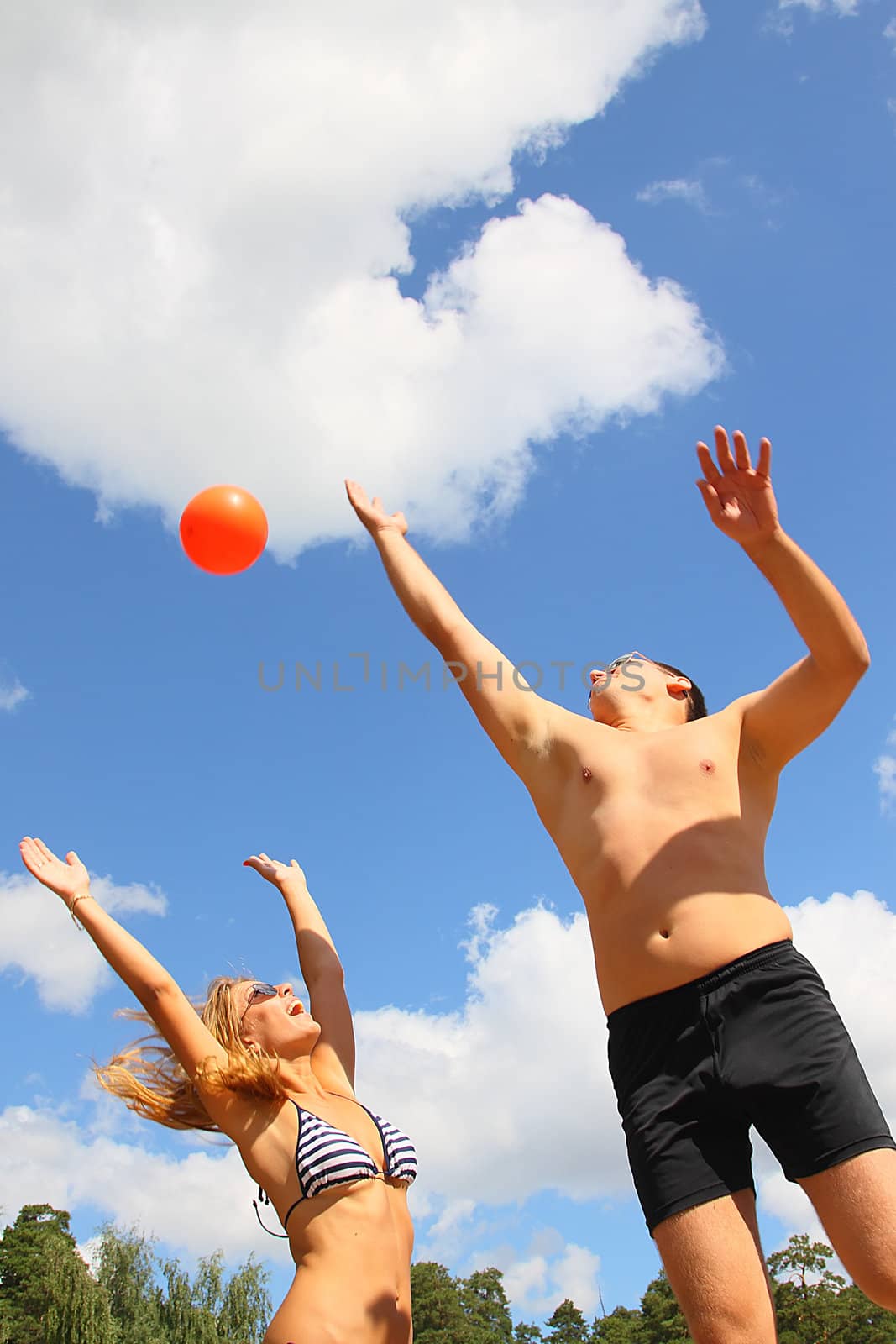 Young men have a rest and play a beach