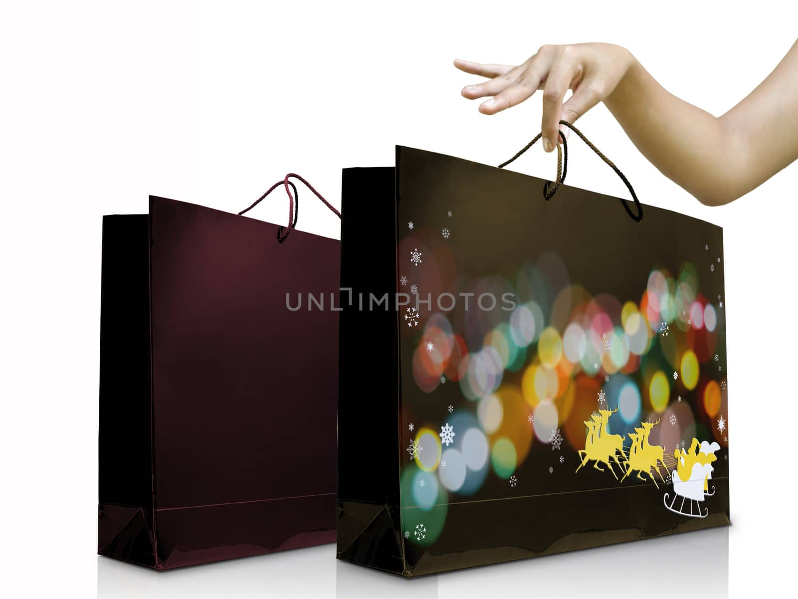Lady hand pick up the christmas bag, Christmas gift concept