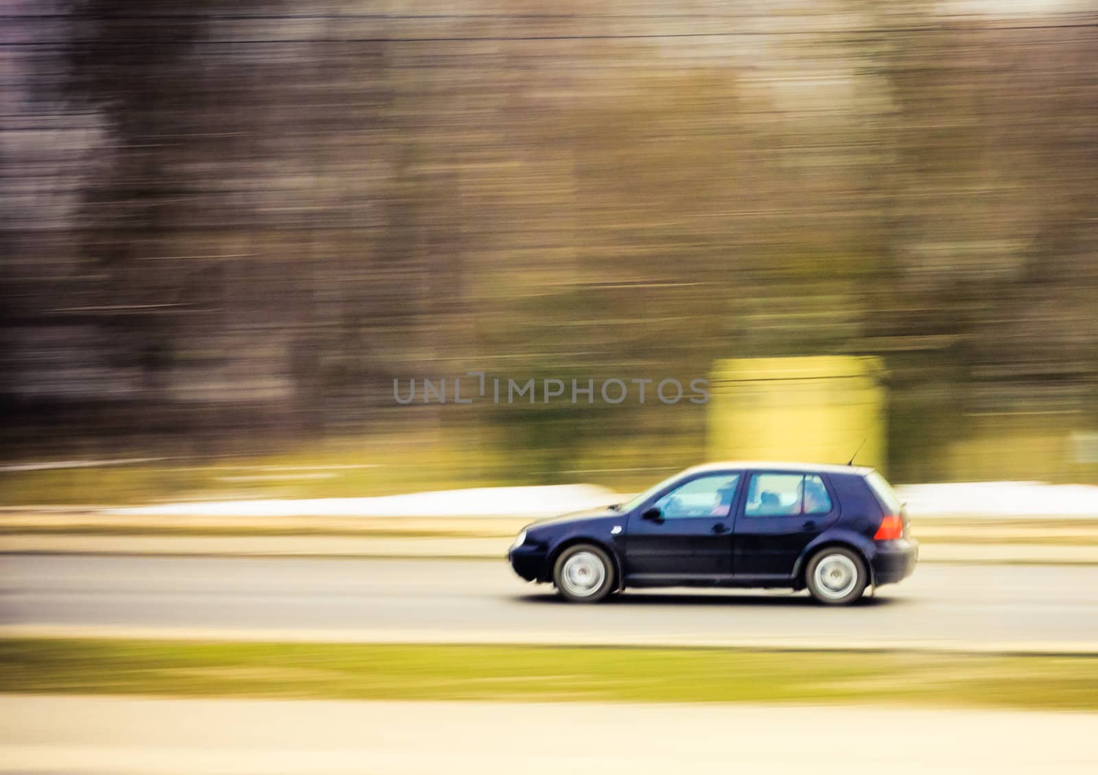 Car on the move, motion blur