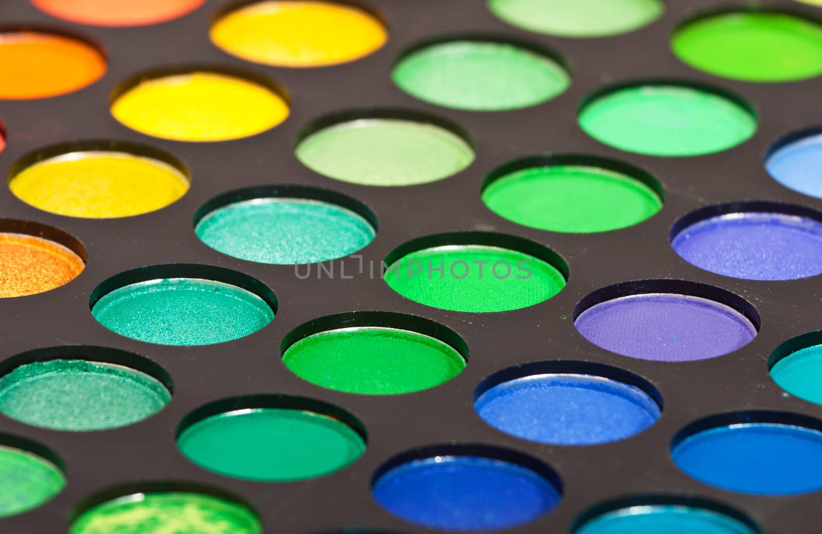 set of multicolored eyeshadows by Discovod