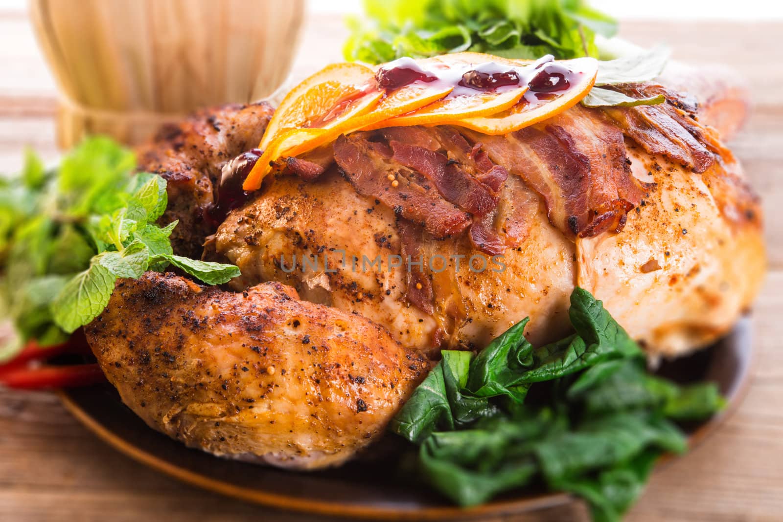 baked turkey with chestnut filling and orange - selective focus