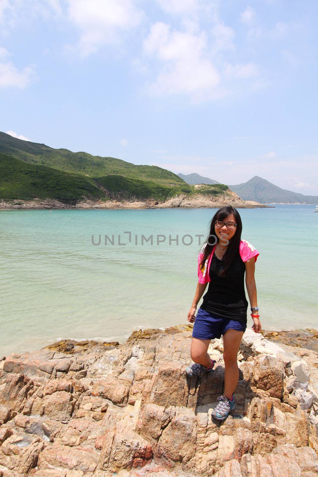 Hiking girl along the coast