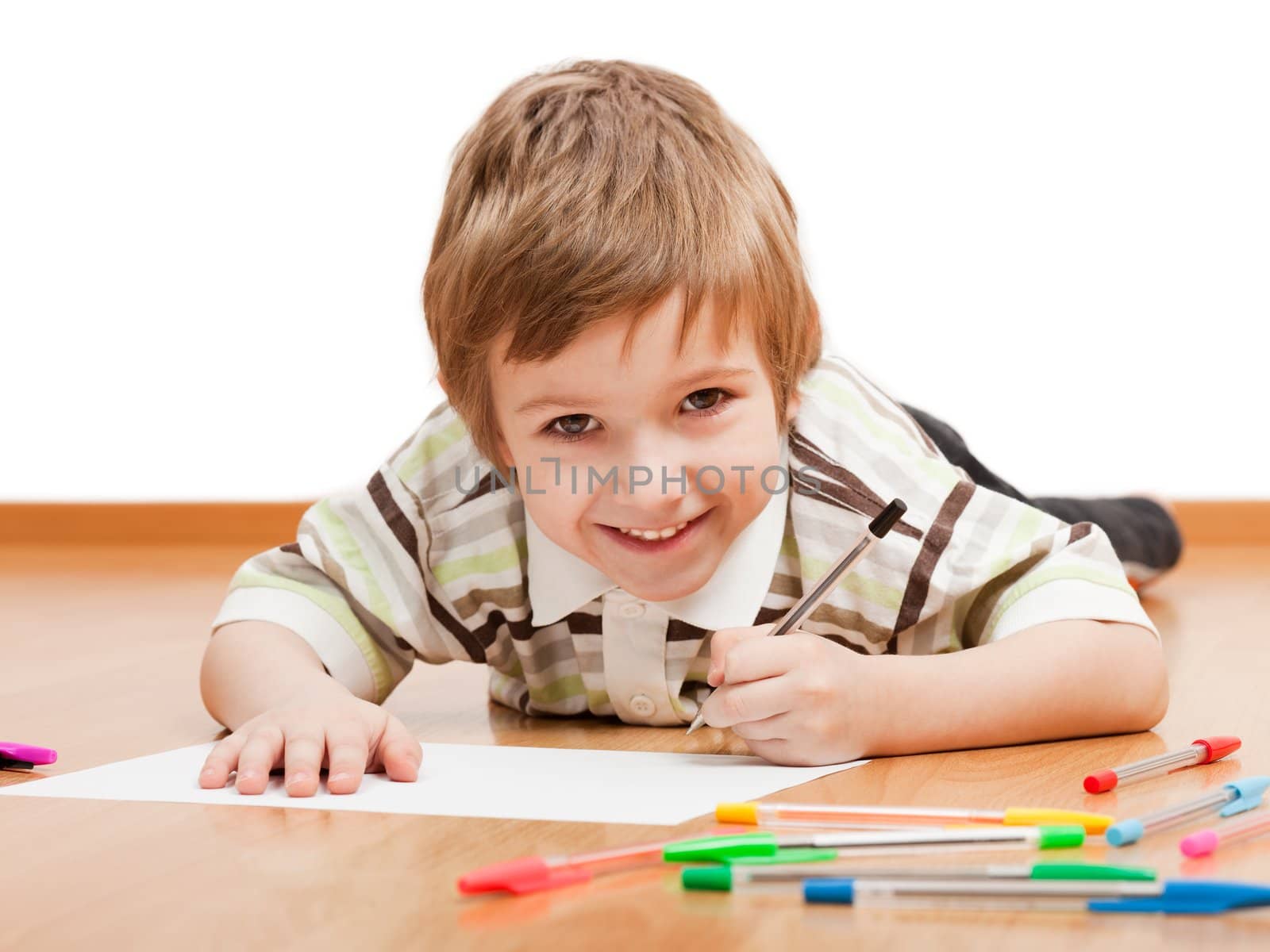 Little child drawing painting or writing letter