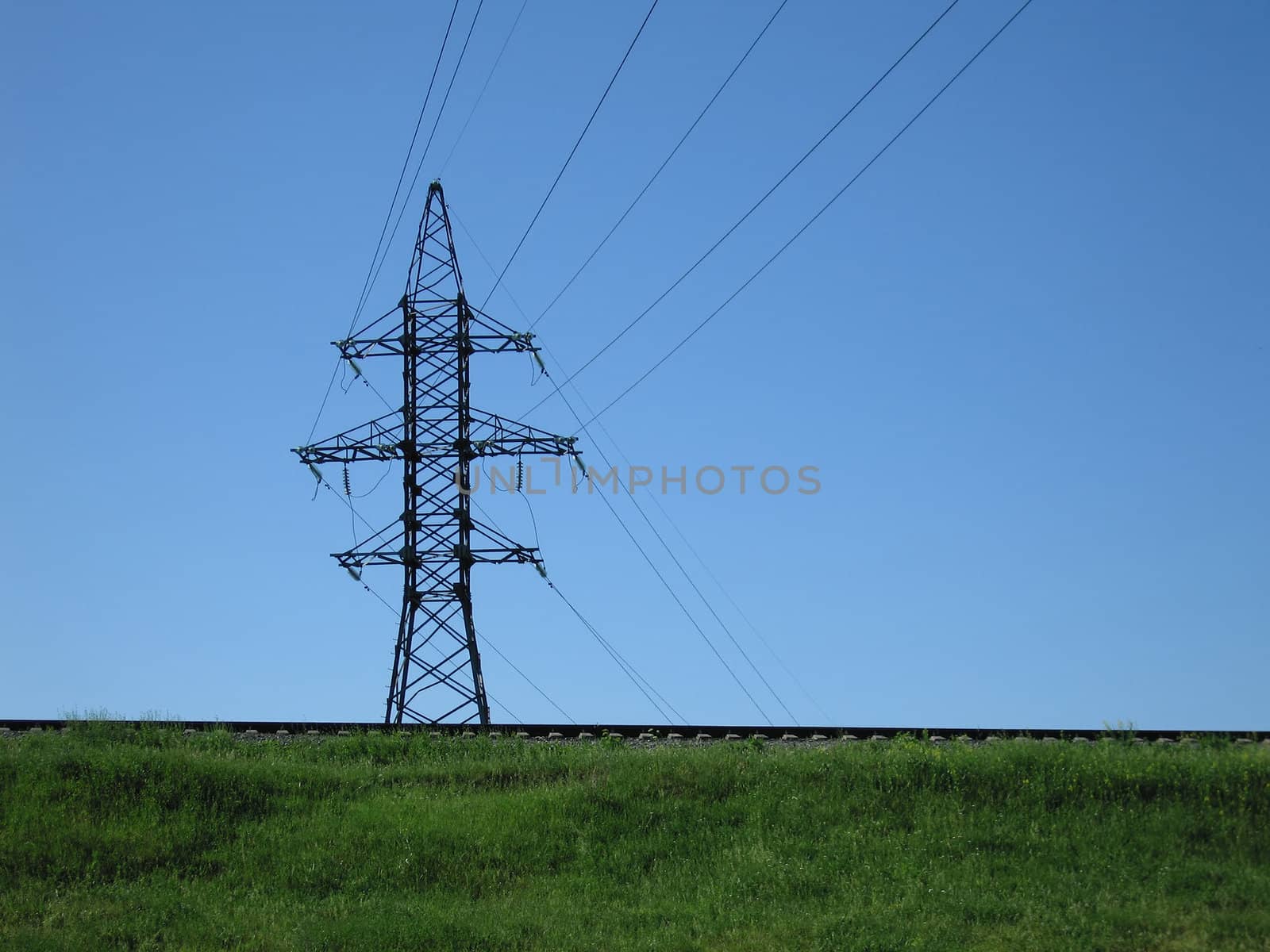 Electricity tower with power line cable on blue sky by ia_64