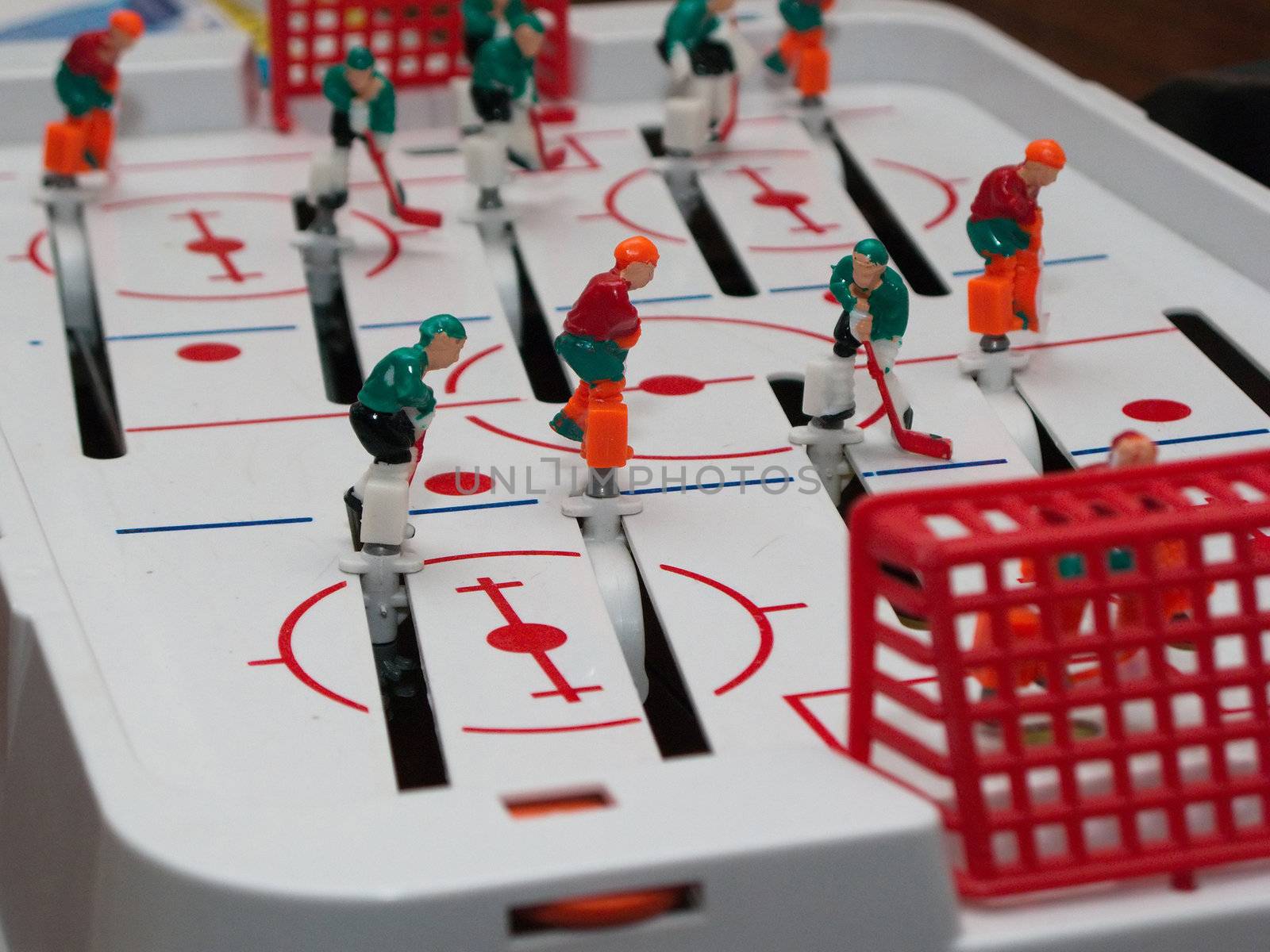 Playing games - ice hockey with puck winter sport