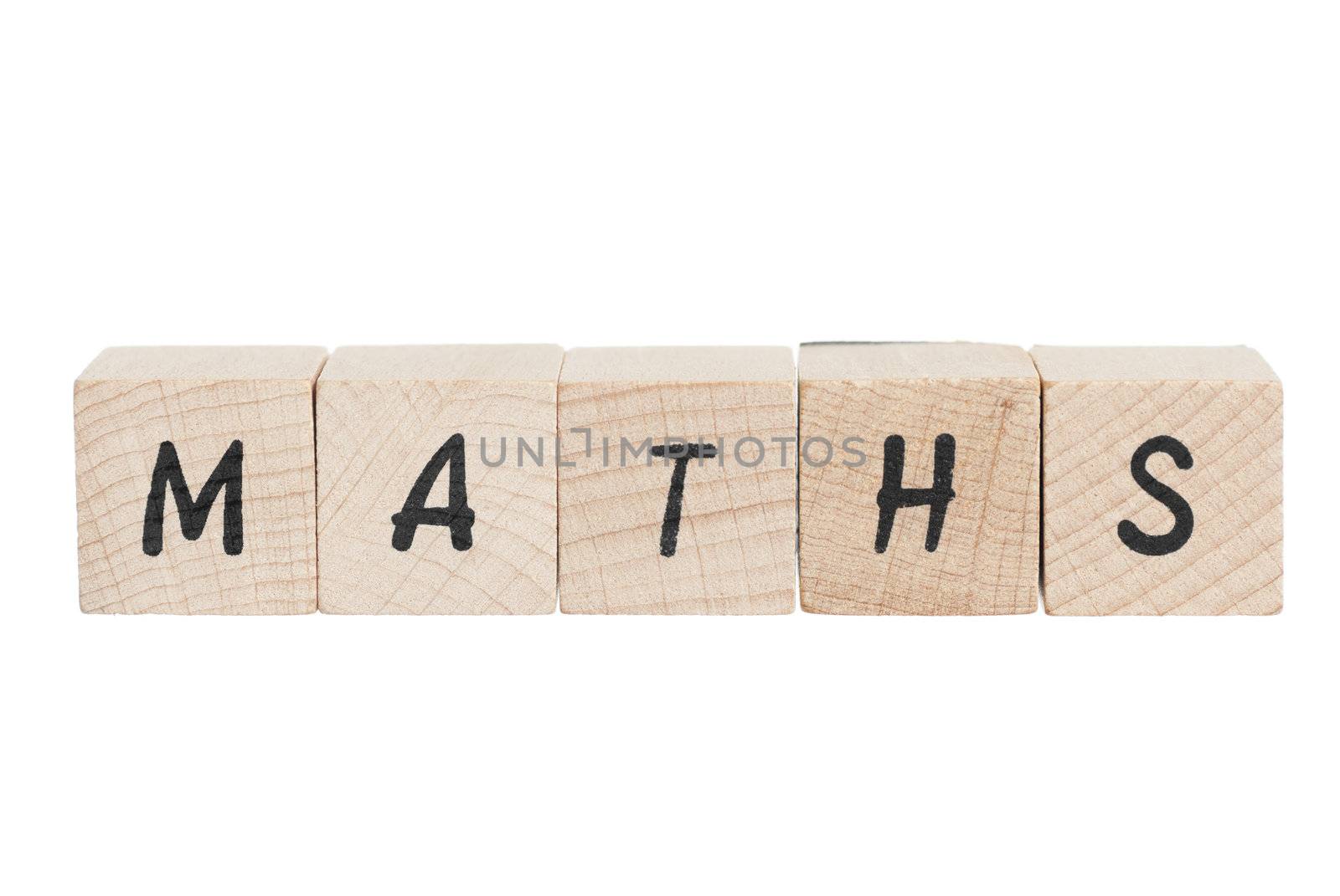 Maths written with wooden blocks. White background.