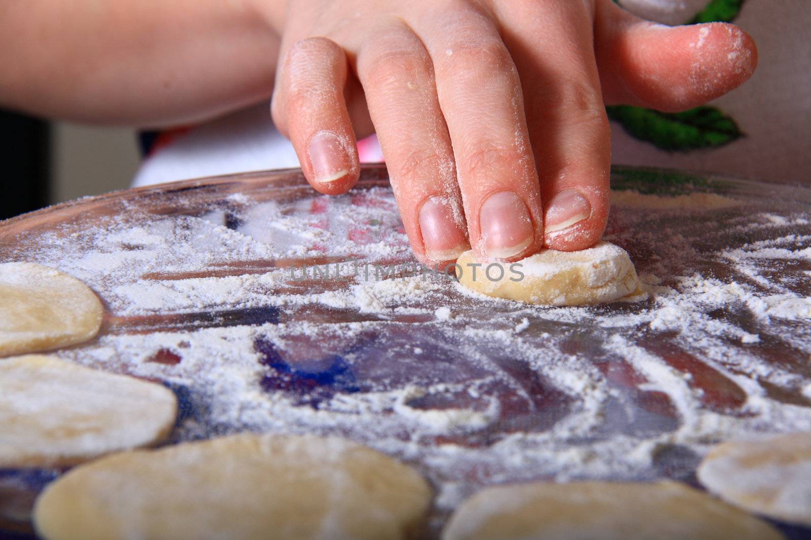 hand made ravioli getting prepared on table 