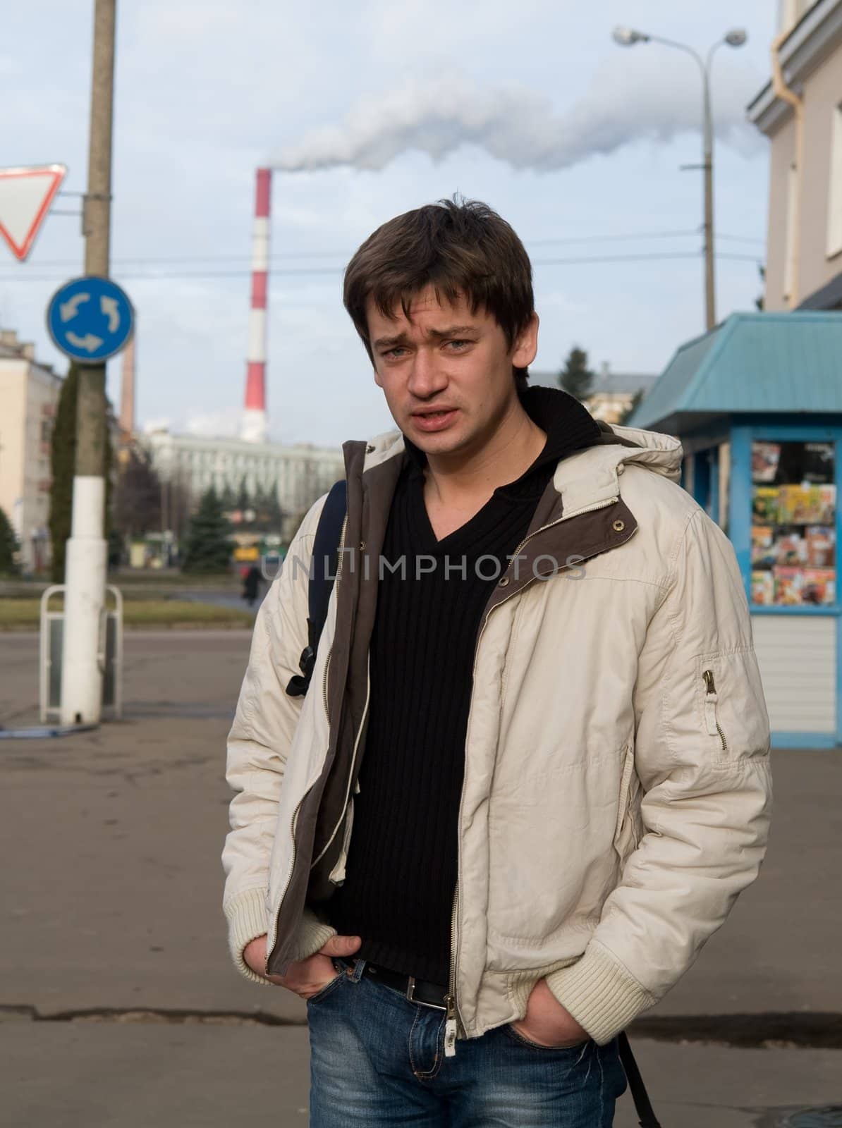 The young man in city street