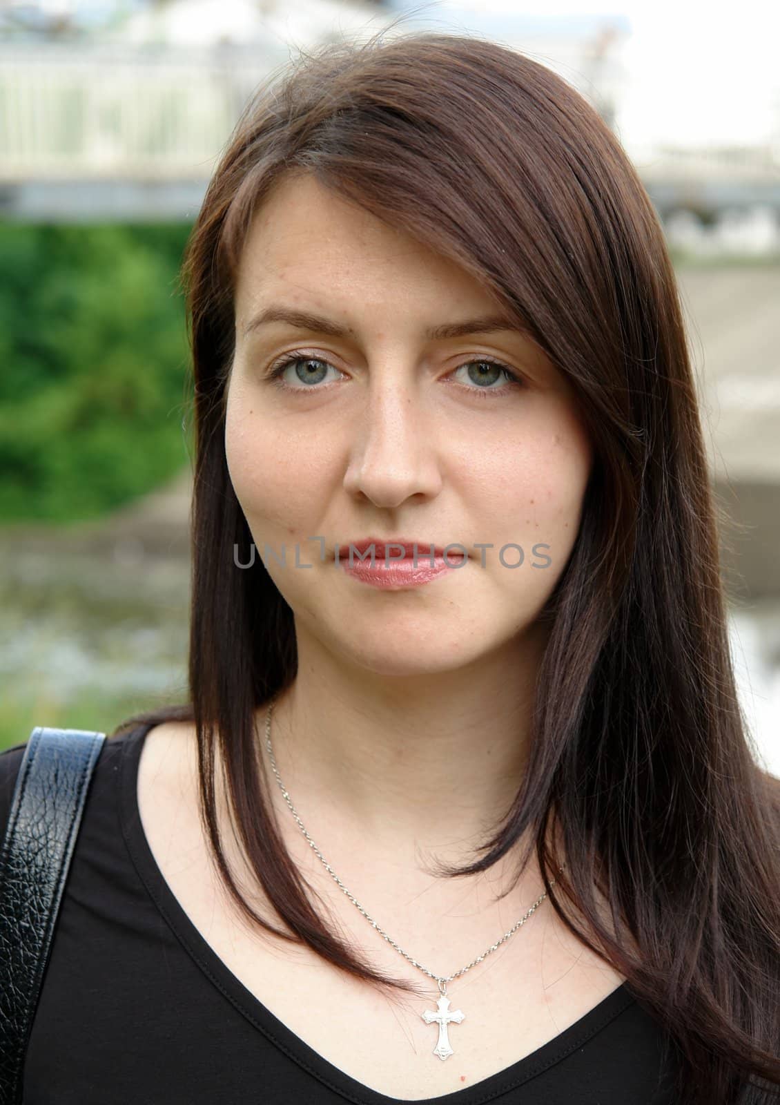 beautiful young woman in a summer park