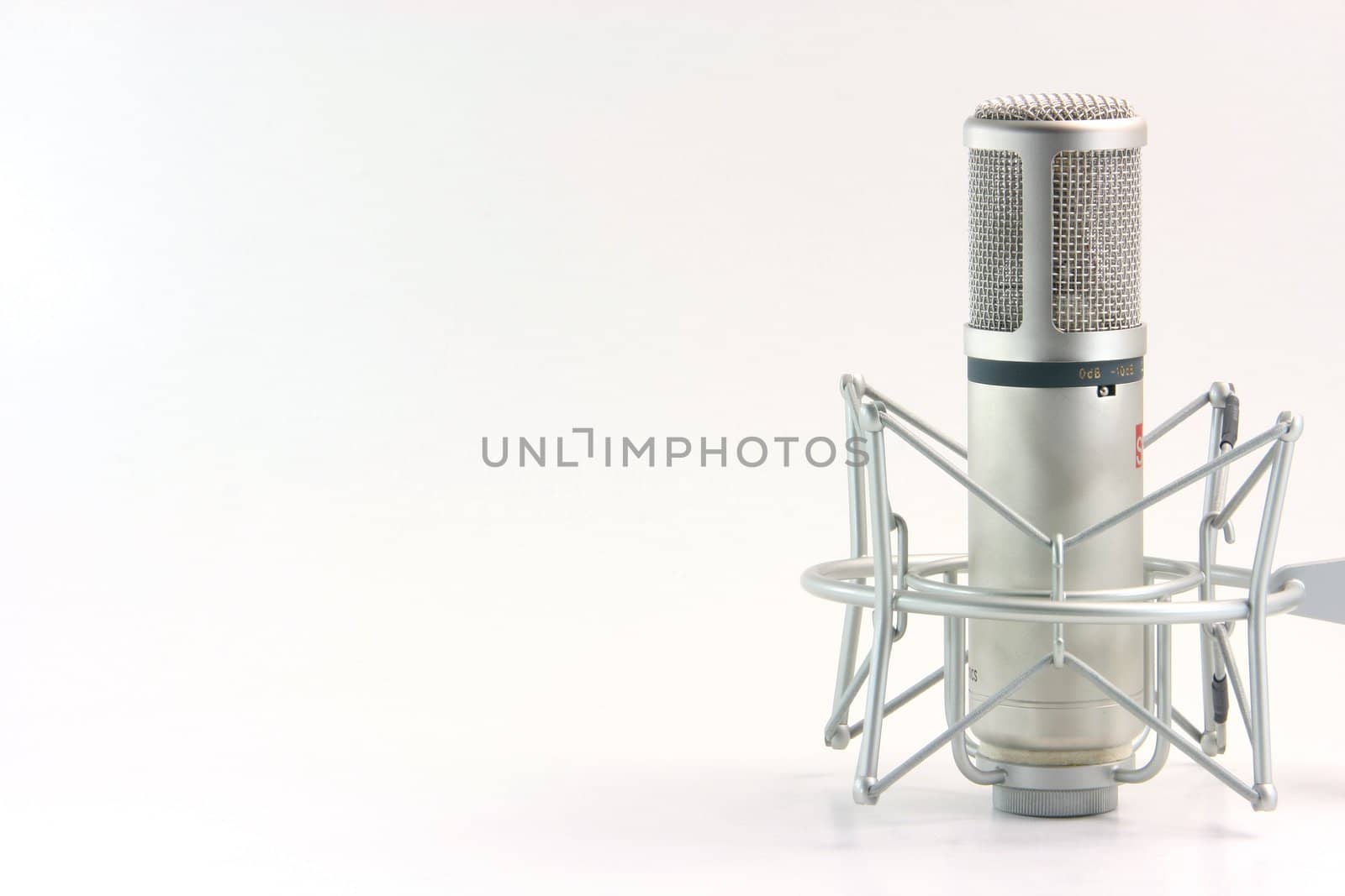 isolated recording microphone with blank space on the left side for message music concepts horizontal
