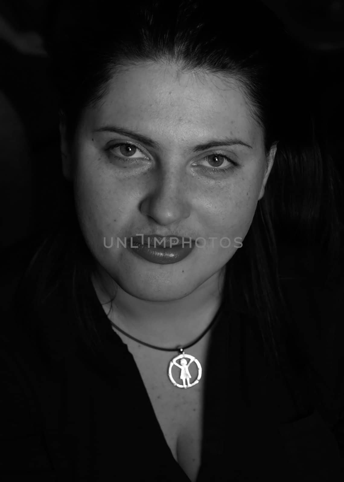 Young beautiful woman. Black-and-white portrait.