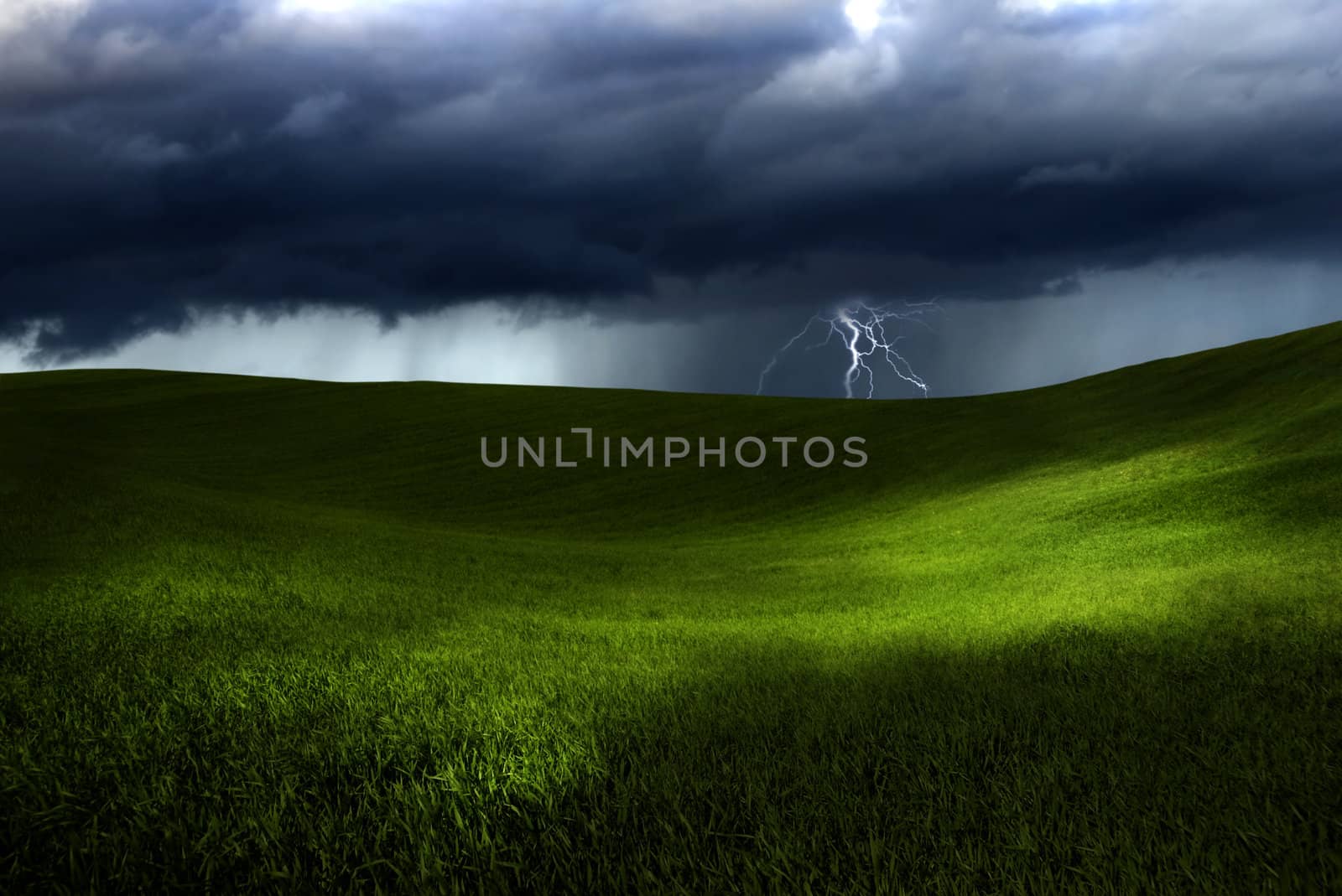 Beautiful green meadow with storm clouds and thunders	