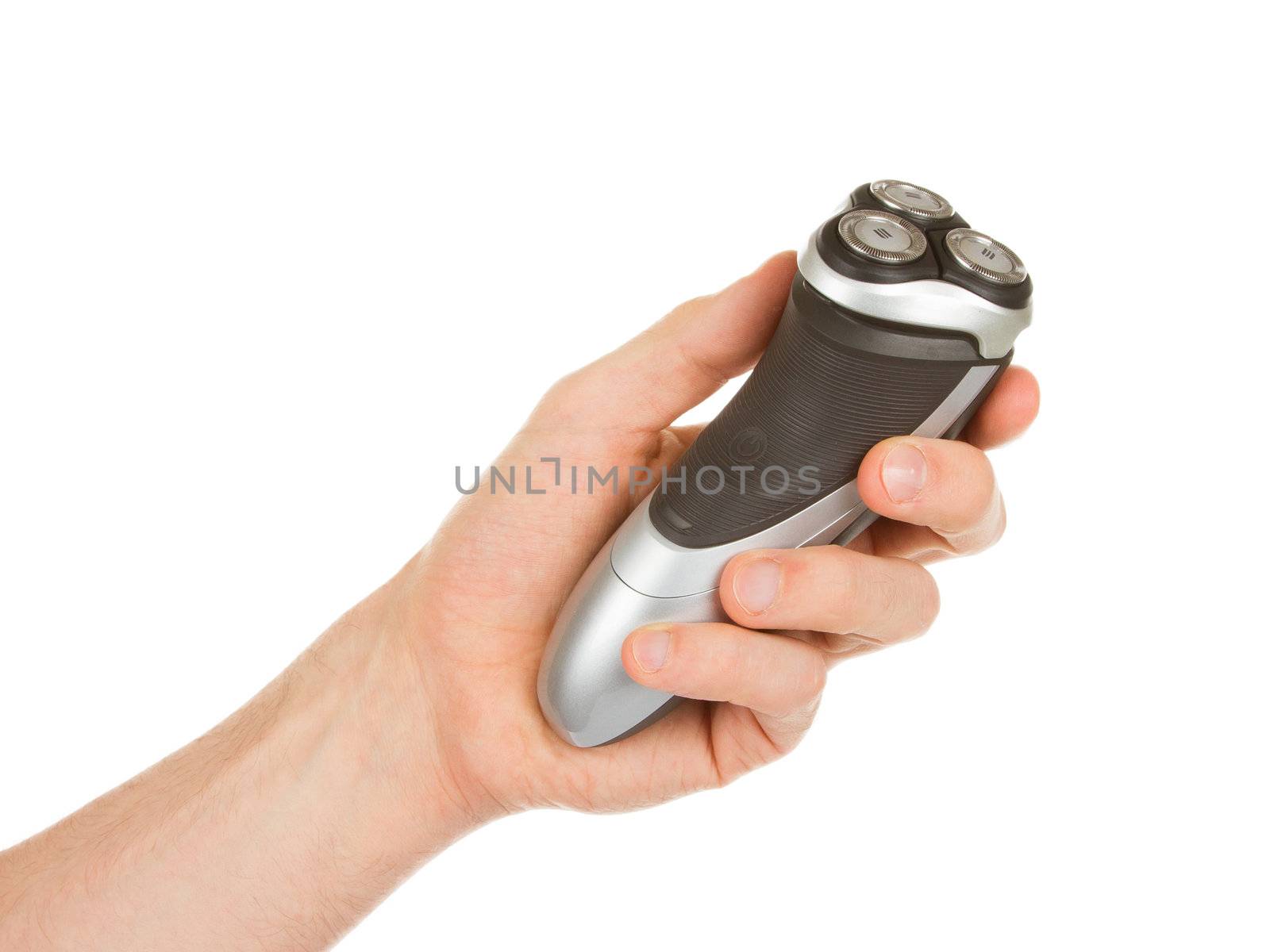 Hand holding an electric shaver  by michaklootwijk