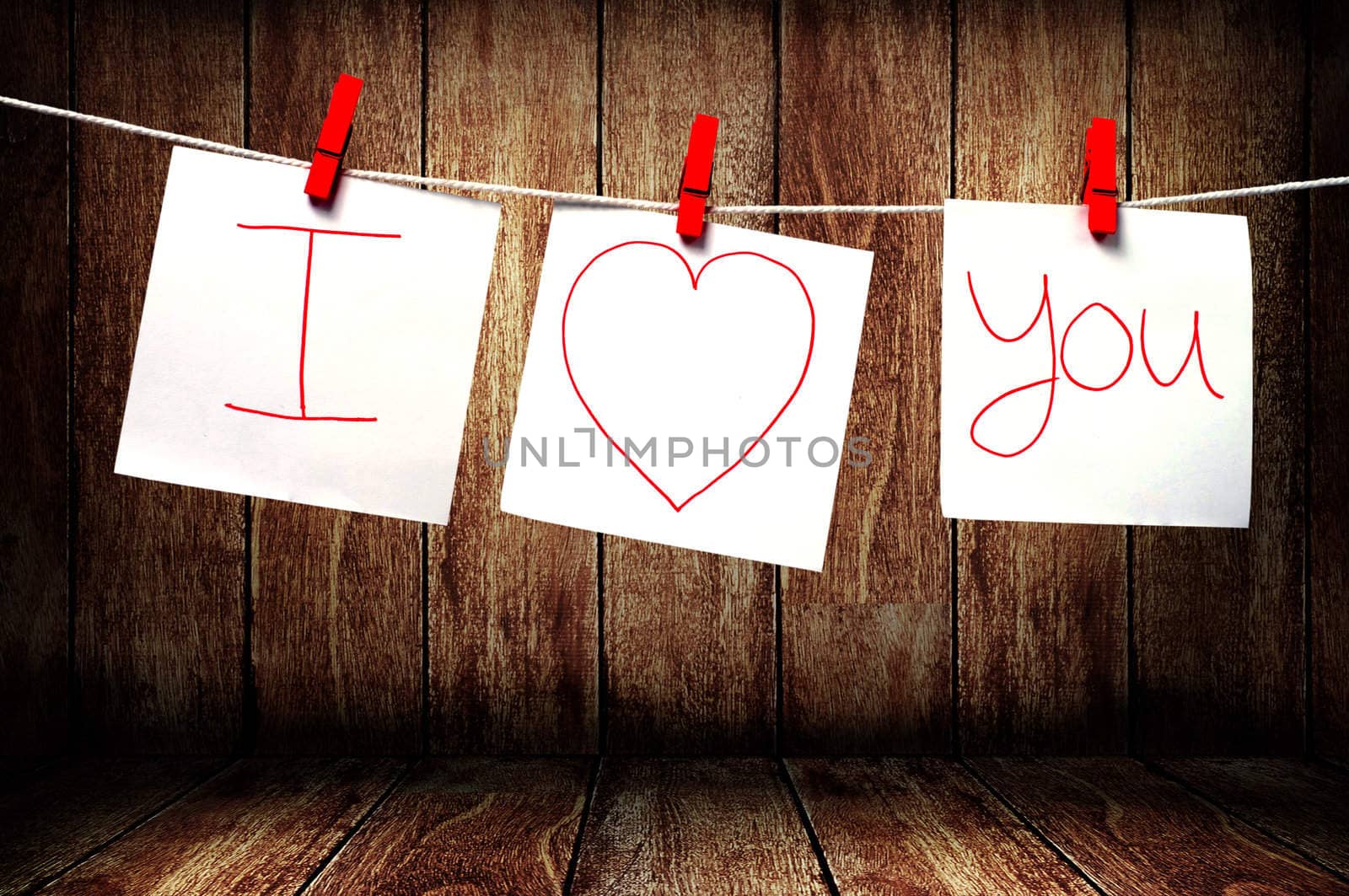 Note paper hanging on a rope, Love note concept by pixbox77